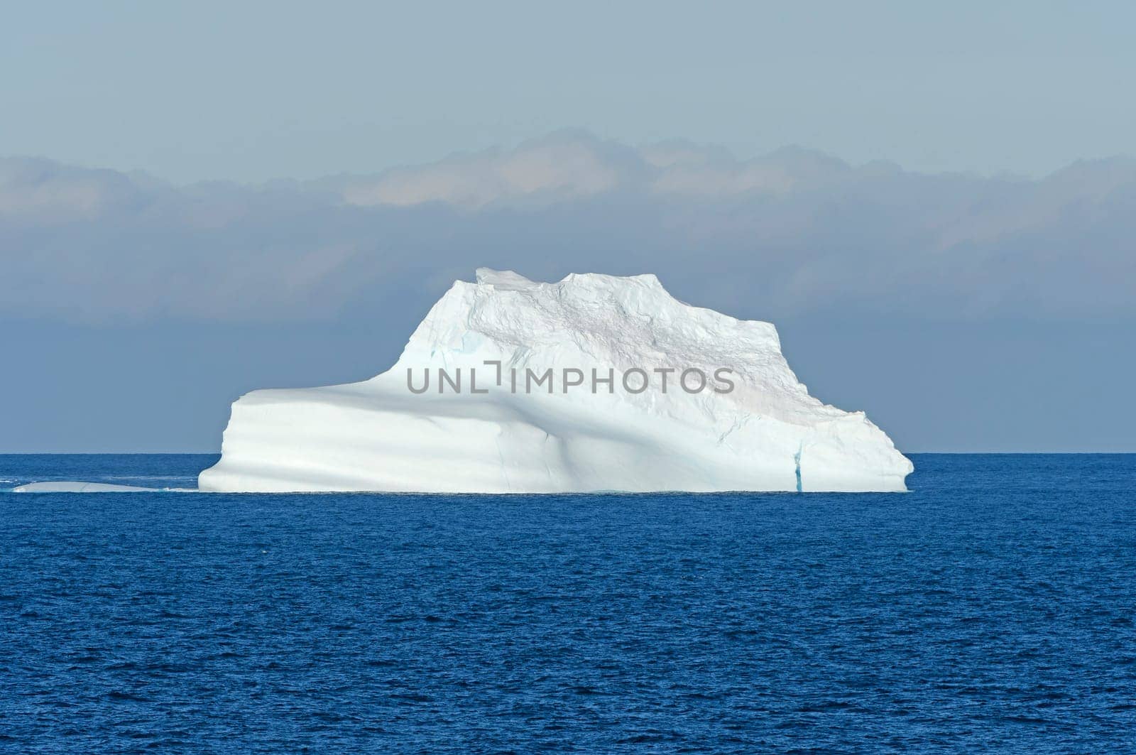 Ocean Iceberg in Bright Sun near Baffin Island in Nunavut, Canada