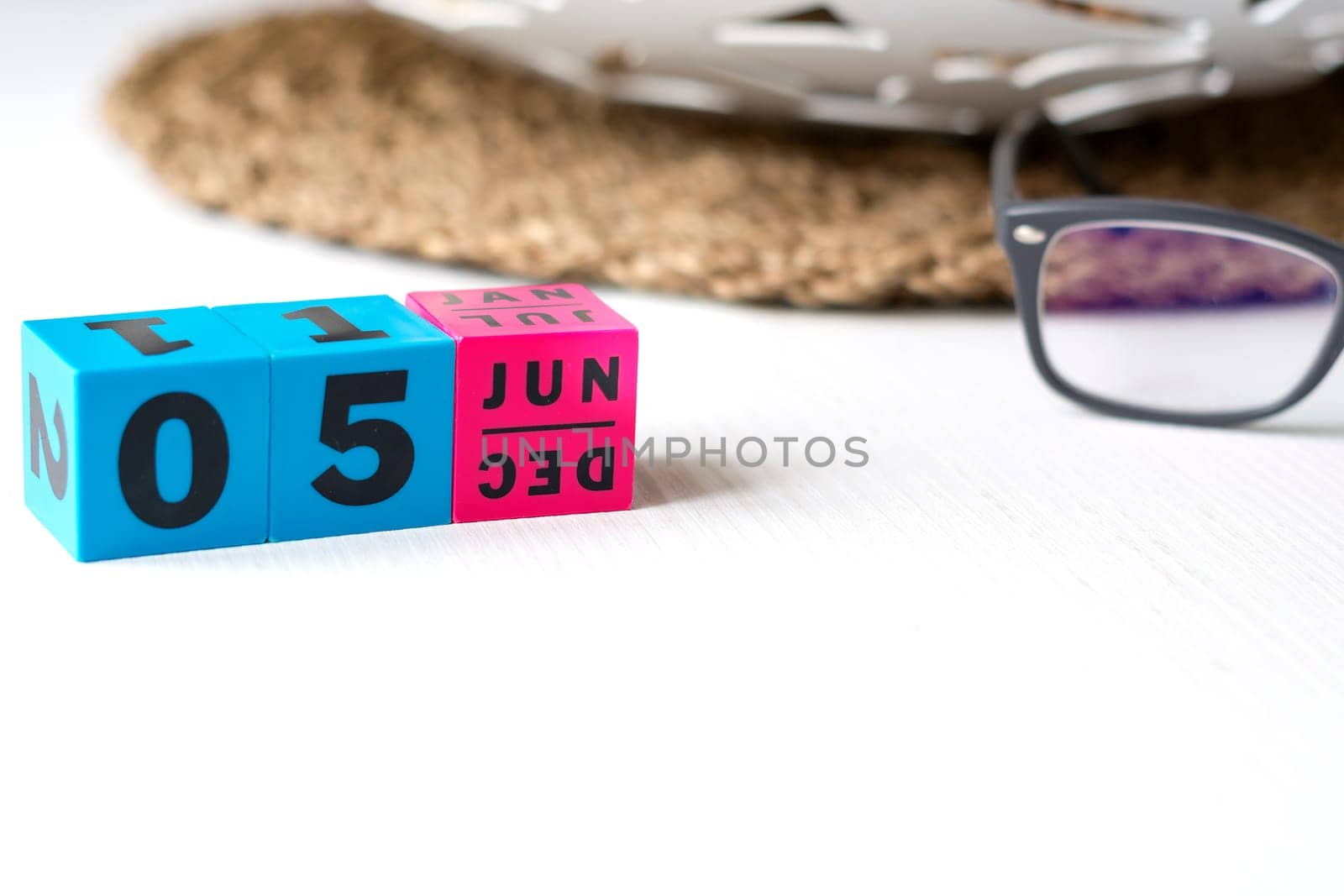 modern perpetual calendar composed of colored cubes and set at the date of June 5