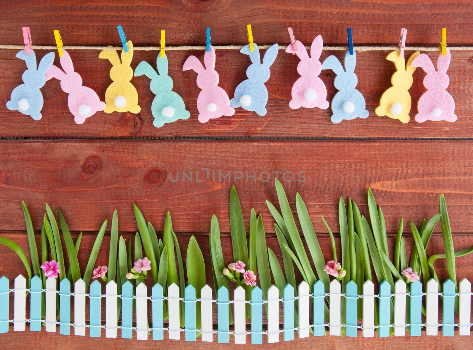 Colorful Easter decoration on a rustic wooden background