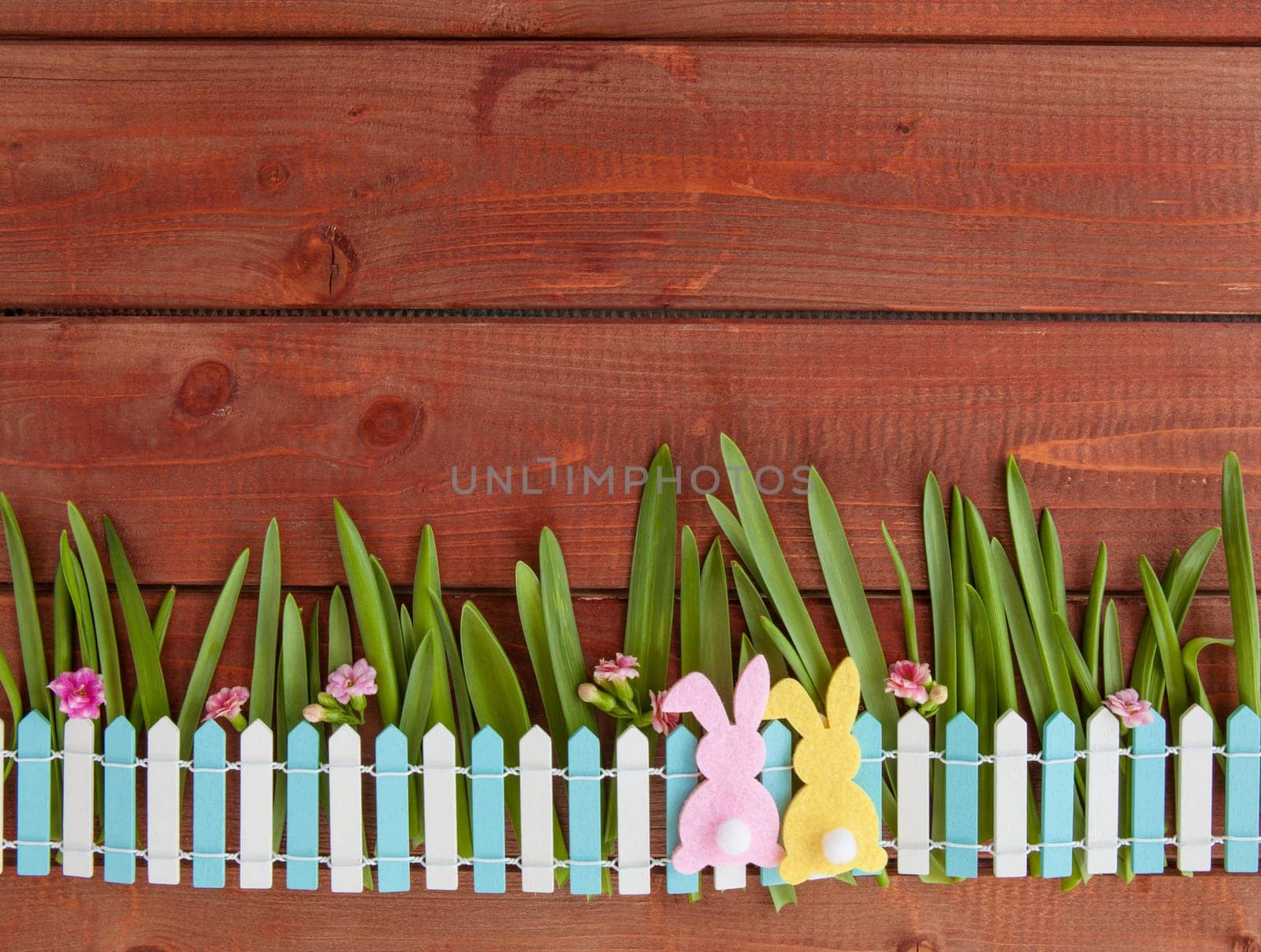 Colorful Easter decoration on a rustic wooden background