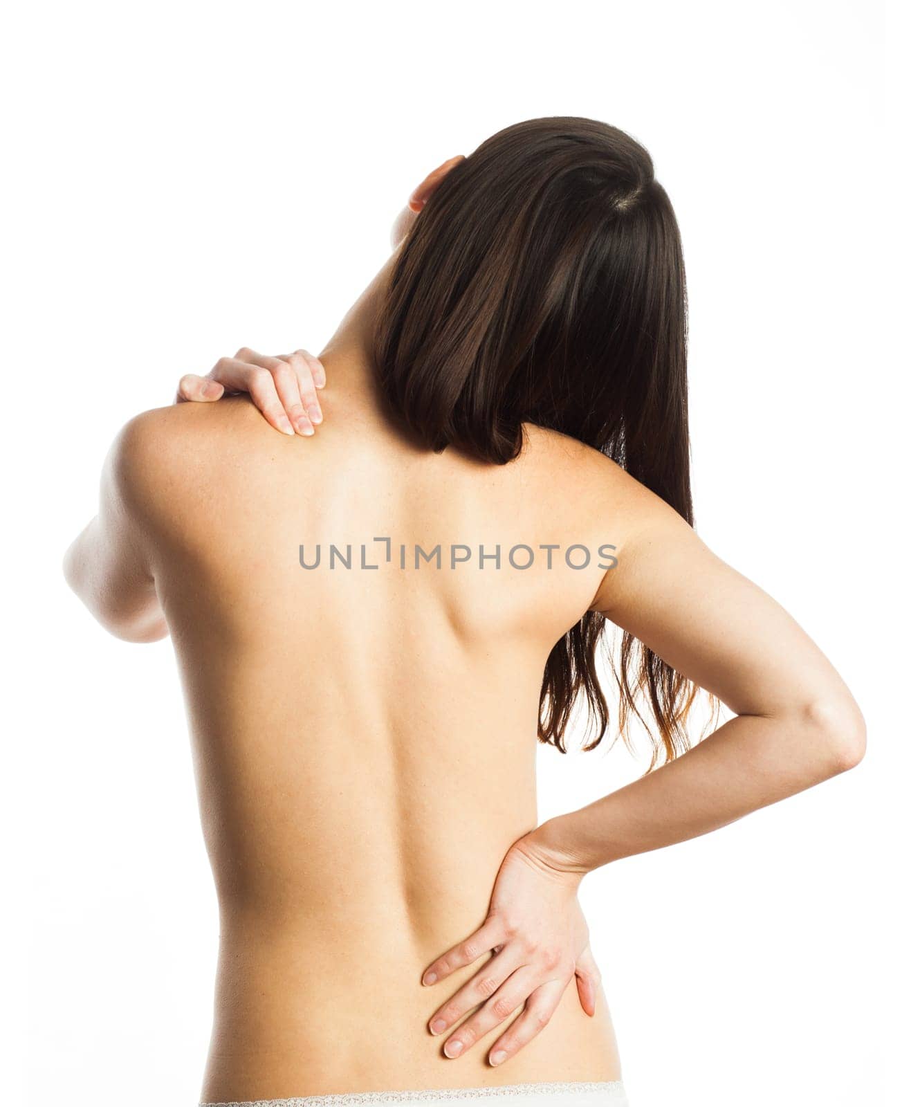 Woman feeling pain on her back, isolated on white