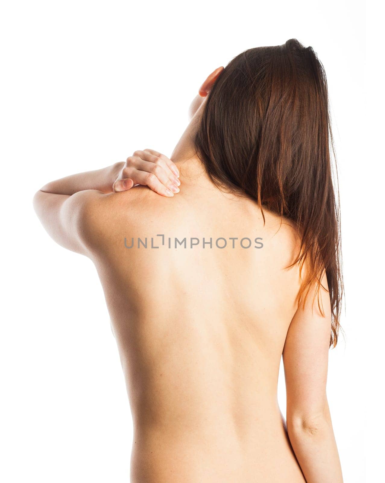Young woman feeling pain on her trapezius muscles, isolated on white