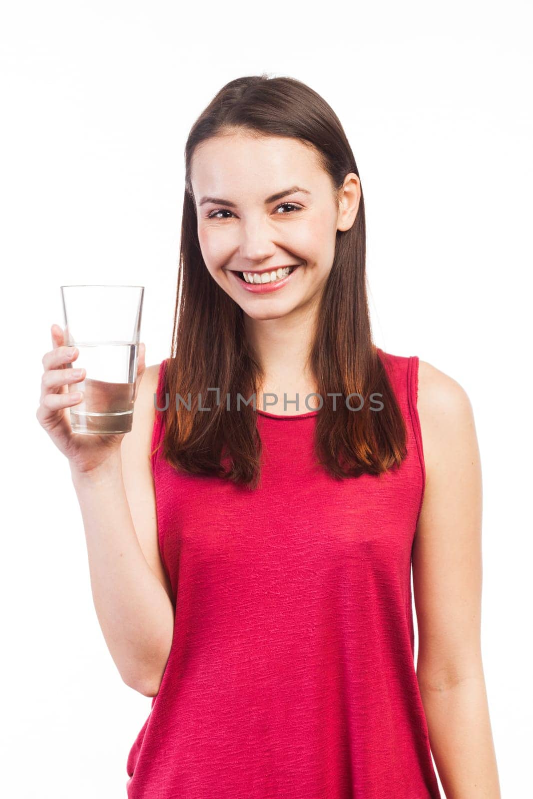 Portrait of a beautiful smiling woman holding a glass of water, health concept, isolated on white