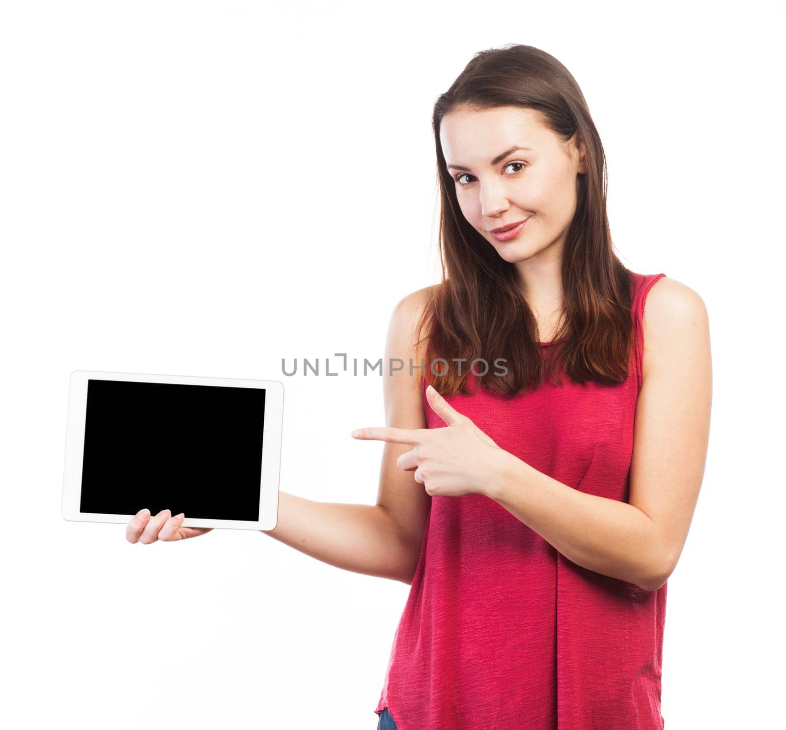 Young woman holding and showing the blank screen of an electronic tablet, isolated on white