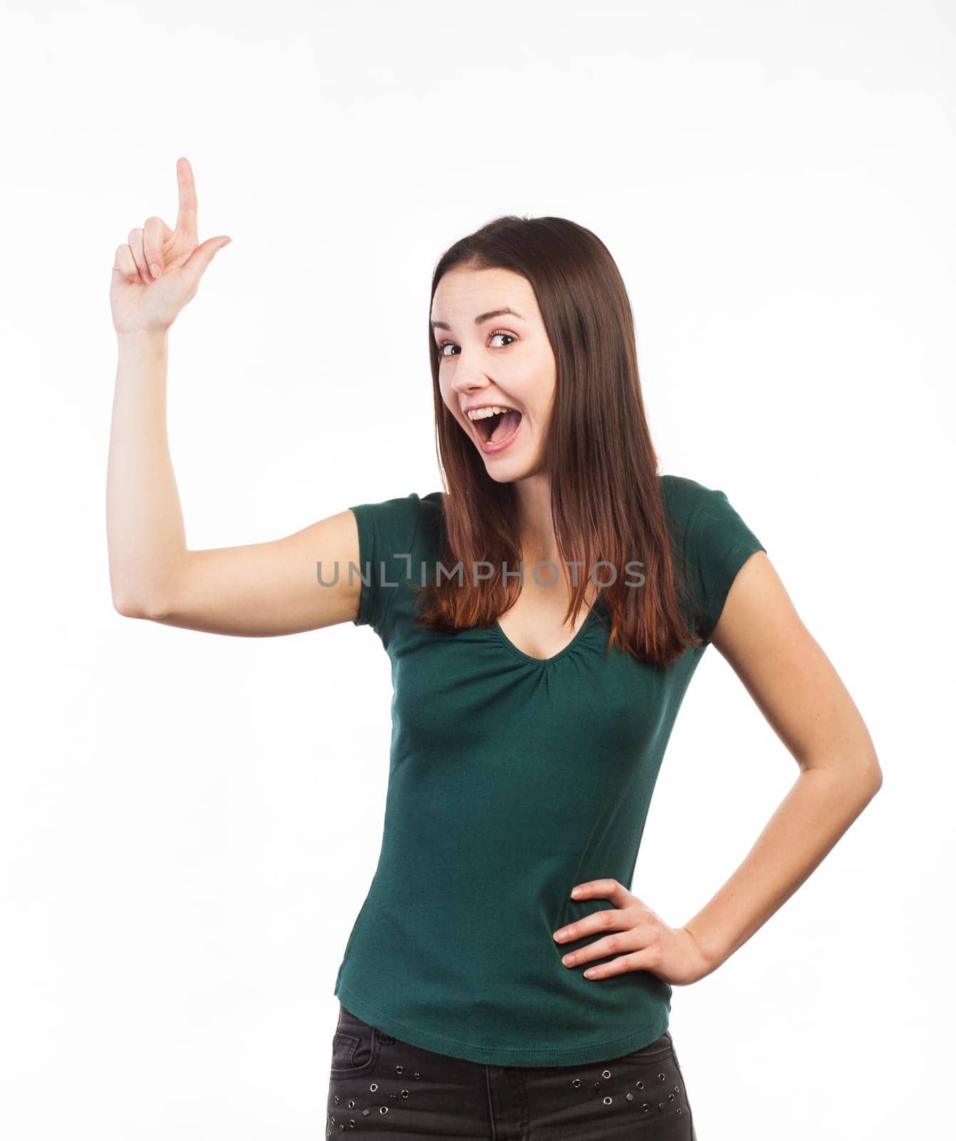 Cheerful woman pointing up at copy space, isolated on white