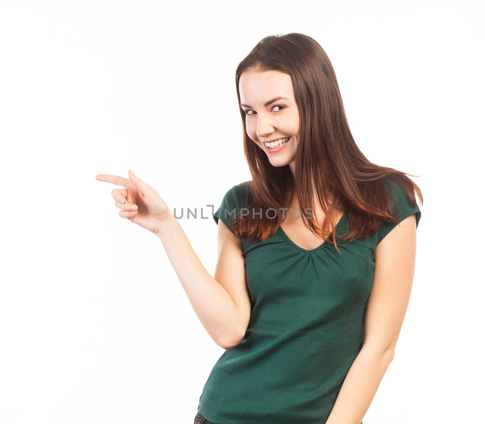 Beautiful woman pointing at copy space, isolated on white
