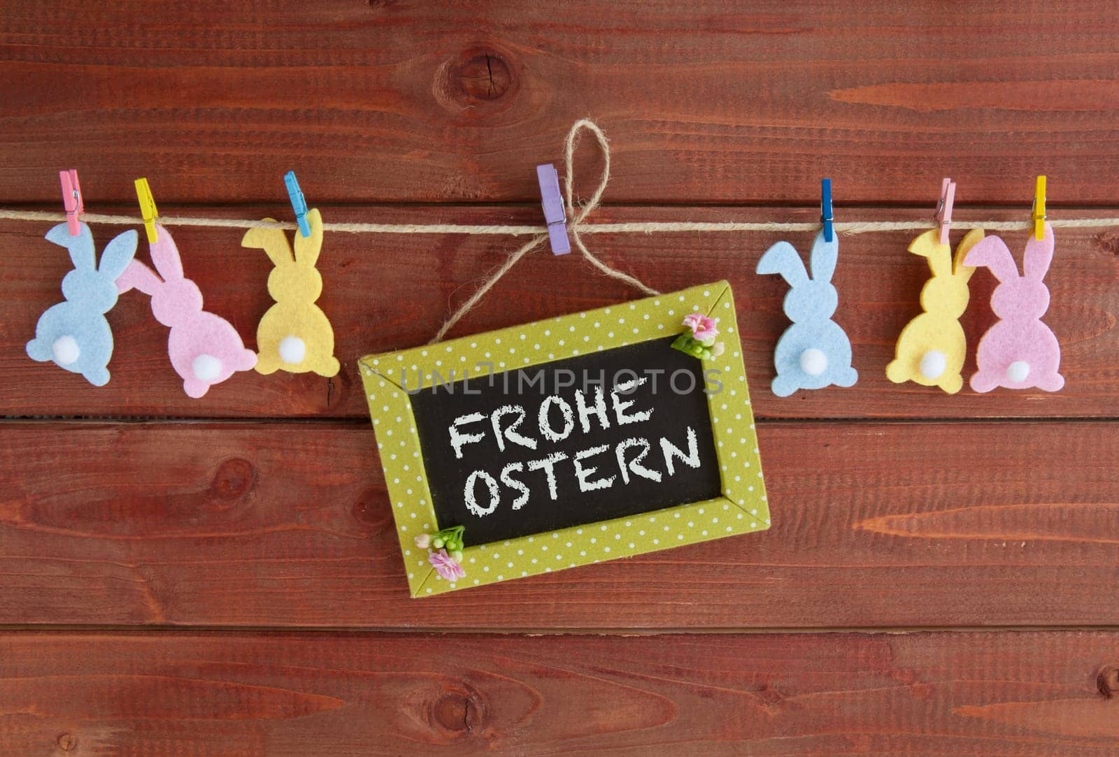 Colorful Easter decoration on a rustic wooden background