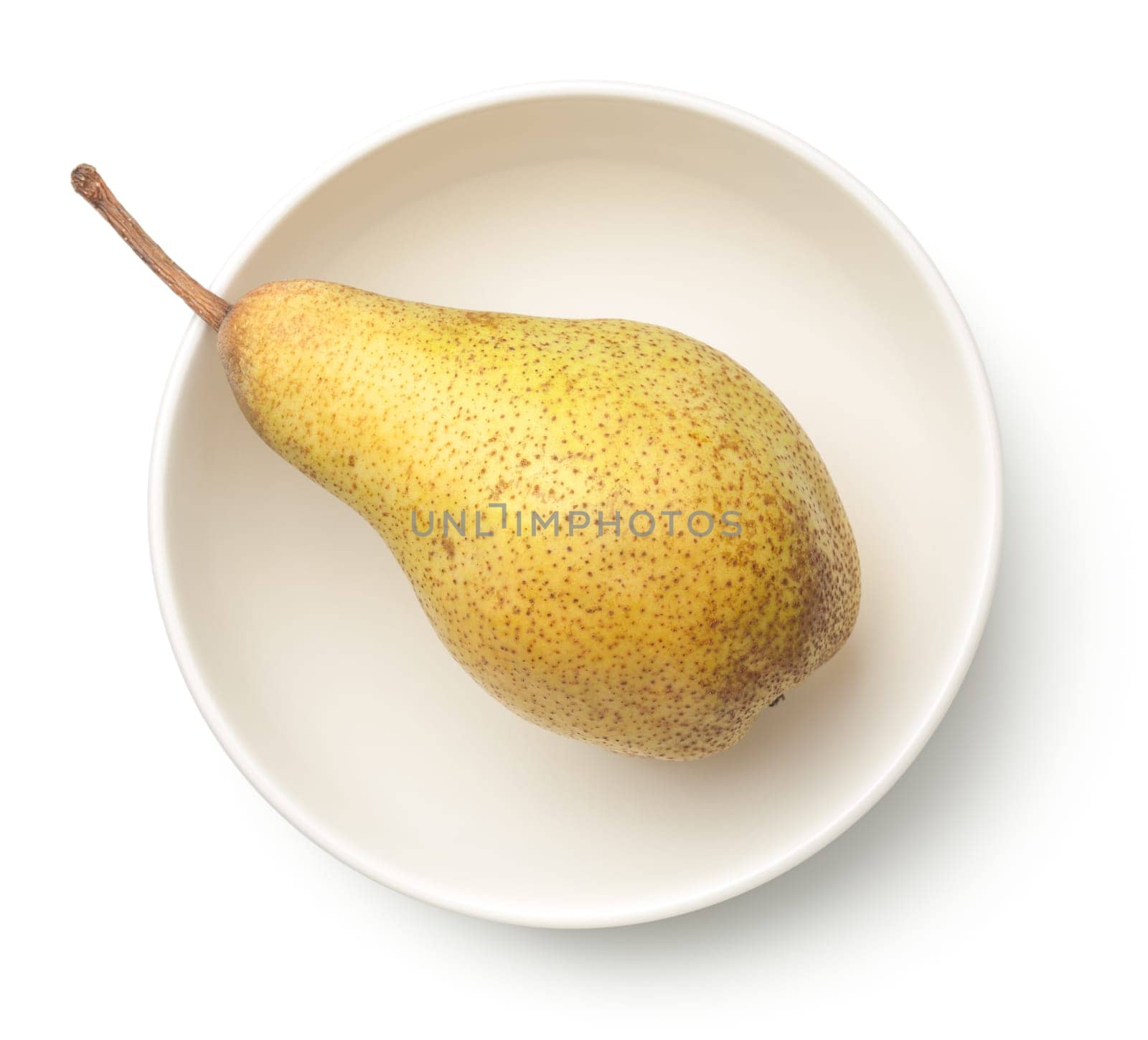 pear in bowl isolated on white background. abate fetel pear. top view