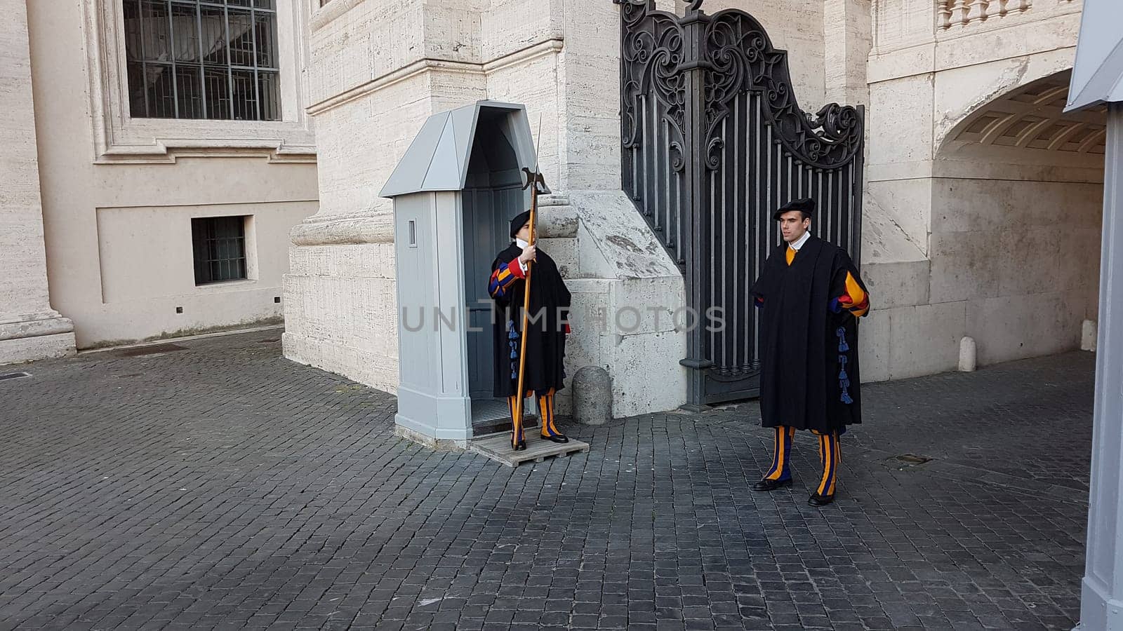 Vatican City, Vatican - February 11, 2018: Pontifical Swiss Guard, Swiss Guard Or Papal Swiss Guards Standing At Gate Of Vatican
