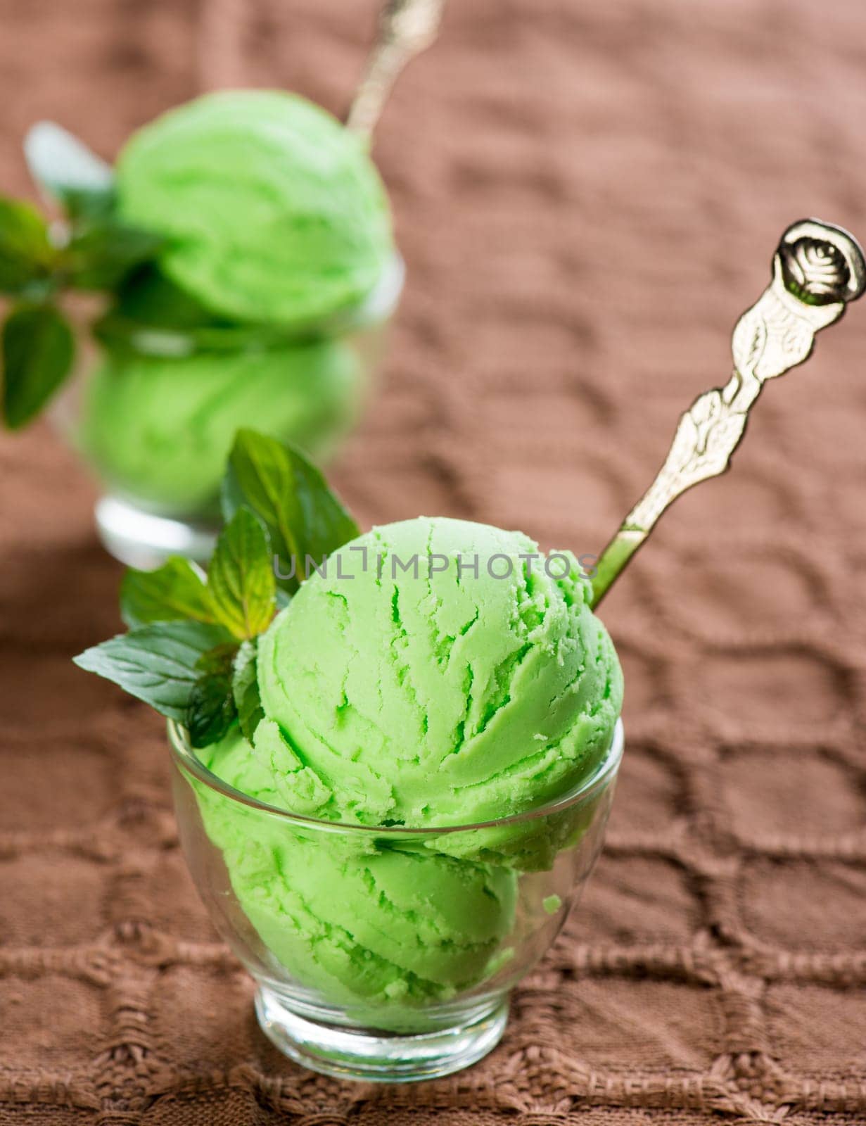 Cups of honeydew ice cream.