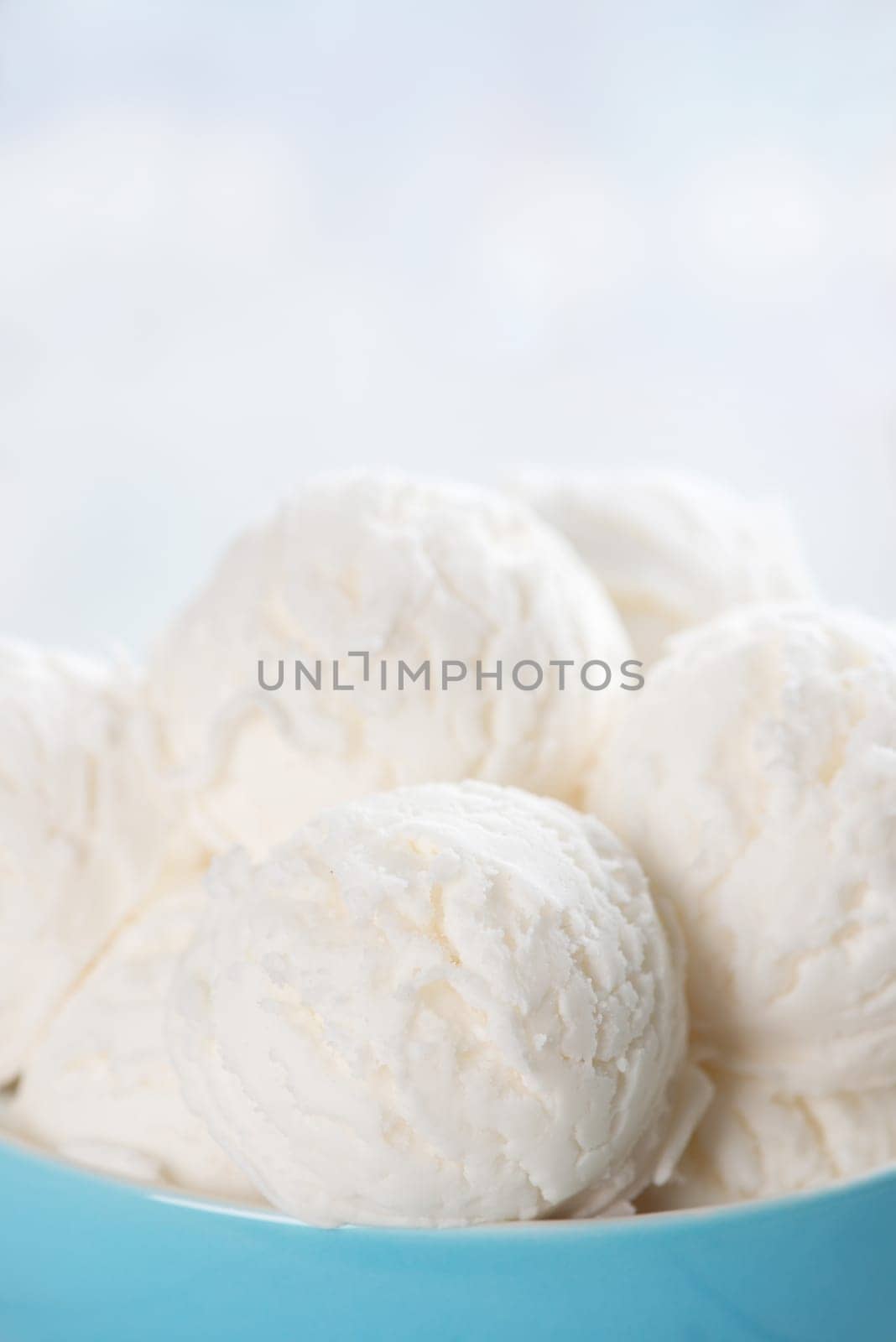 Milk ice cream in bowl close up .