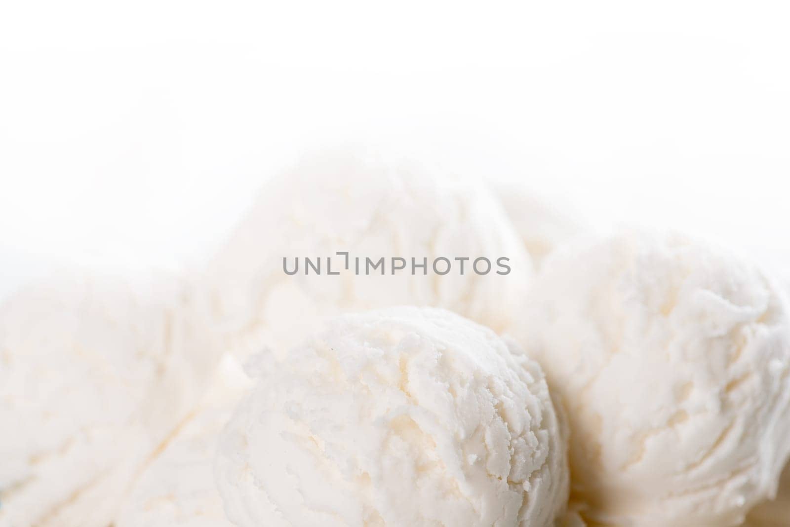 Coconut ice cream close up on white background.
