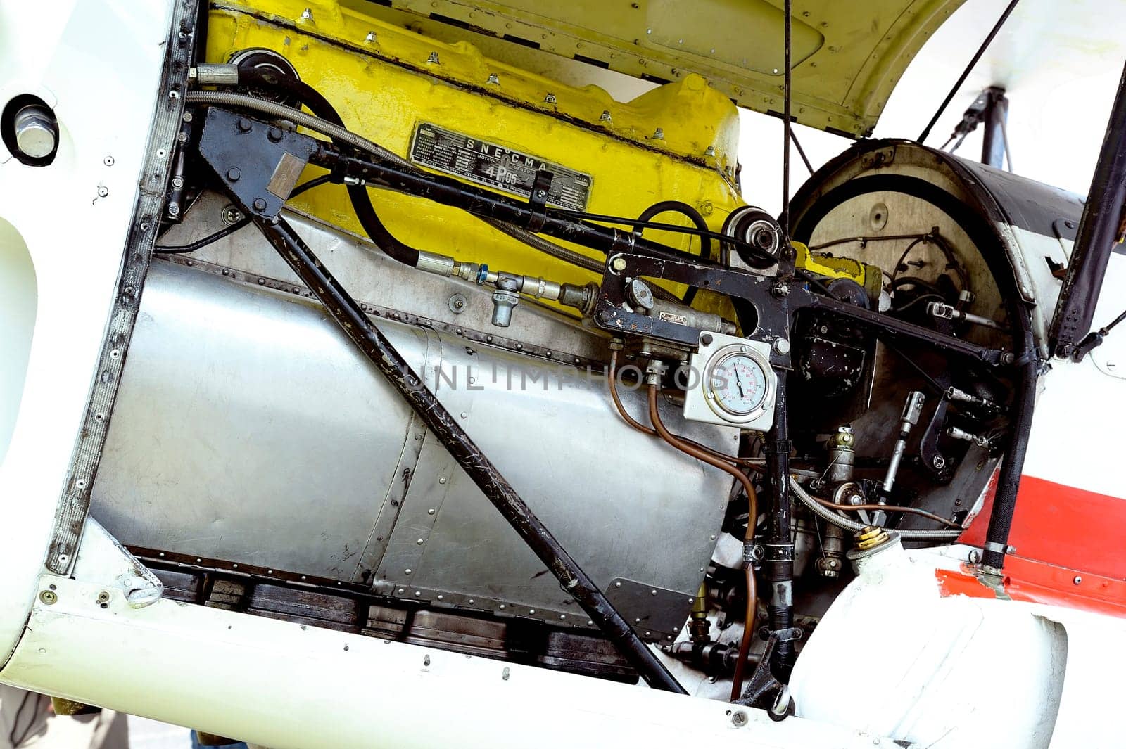 Detail of an engine of an old biplane Stampe on the Mende airfield in the French department of Gard