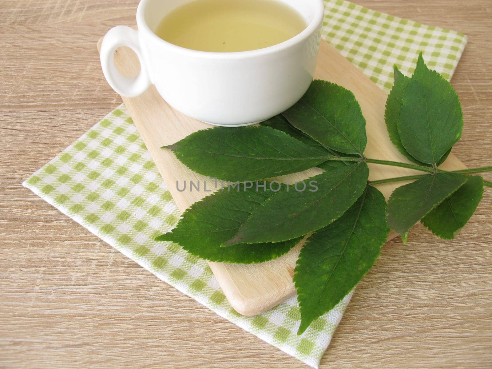 Boiled tea with elderberry leaves