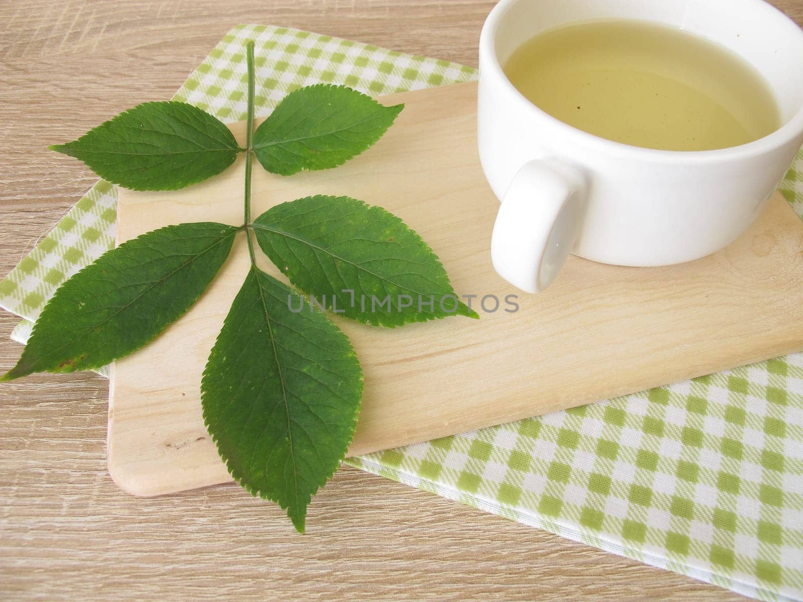 Boiled tea with elderberry leaves