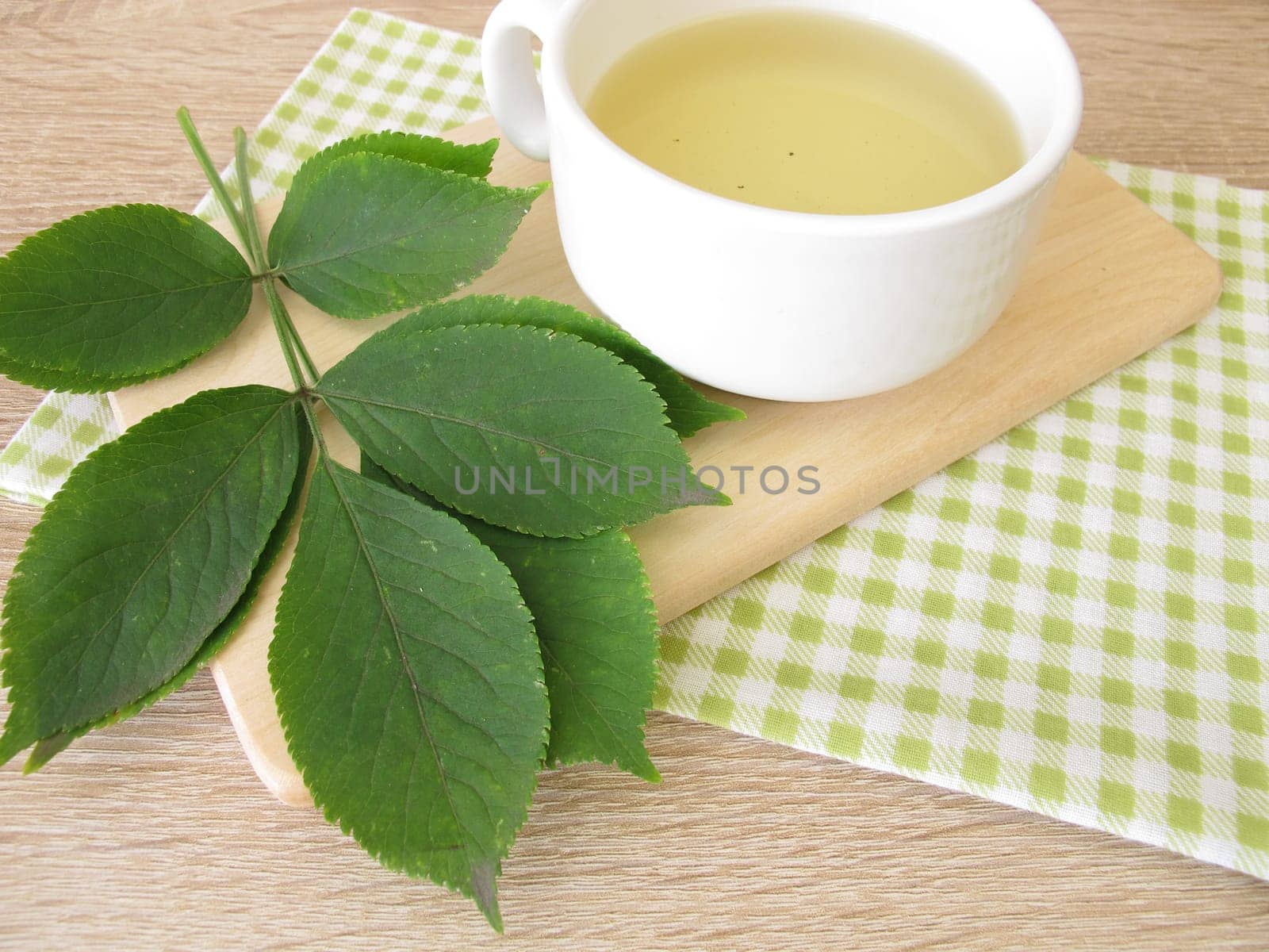 Boiled tea with elderberry leaves