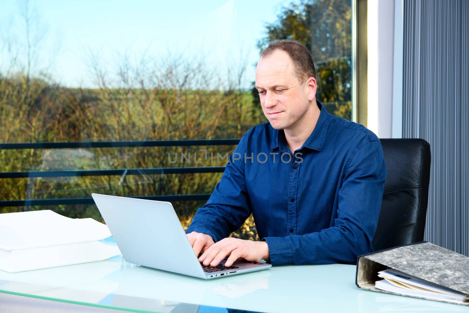 young business man at his desk working