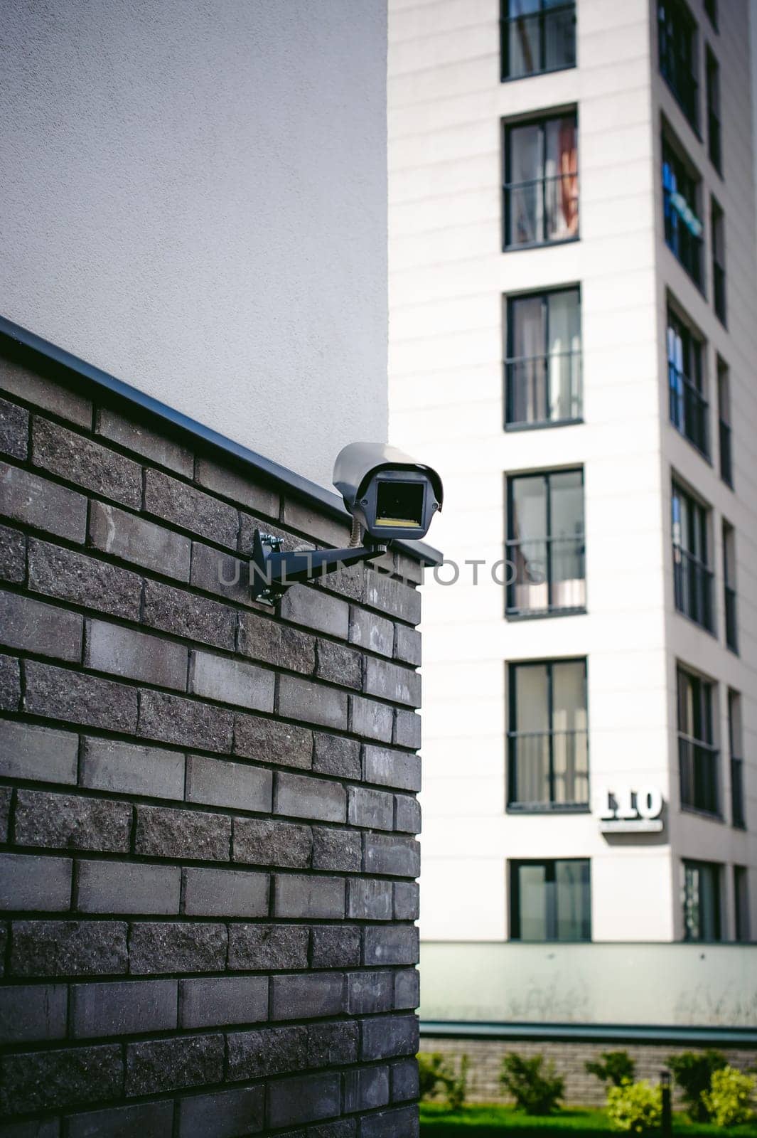 outdoor CCTV camera external video surveillance system. installed on the facade of a residential building
