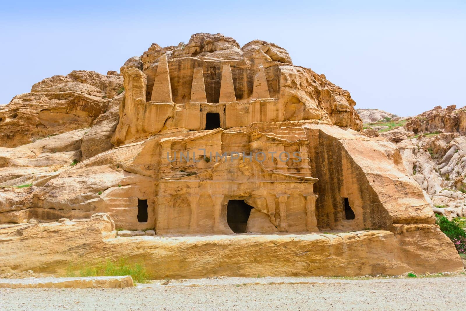 Temple in Petra. Made by digging a holes in the rocks and cutting the hill. Jordan