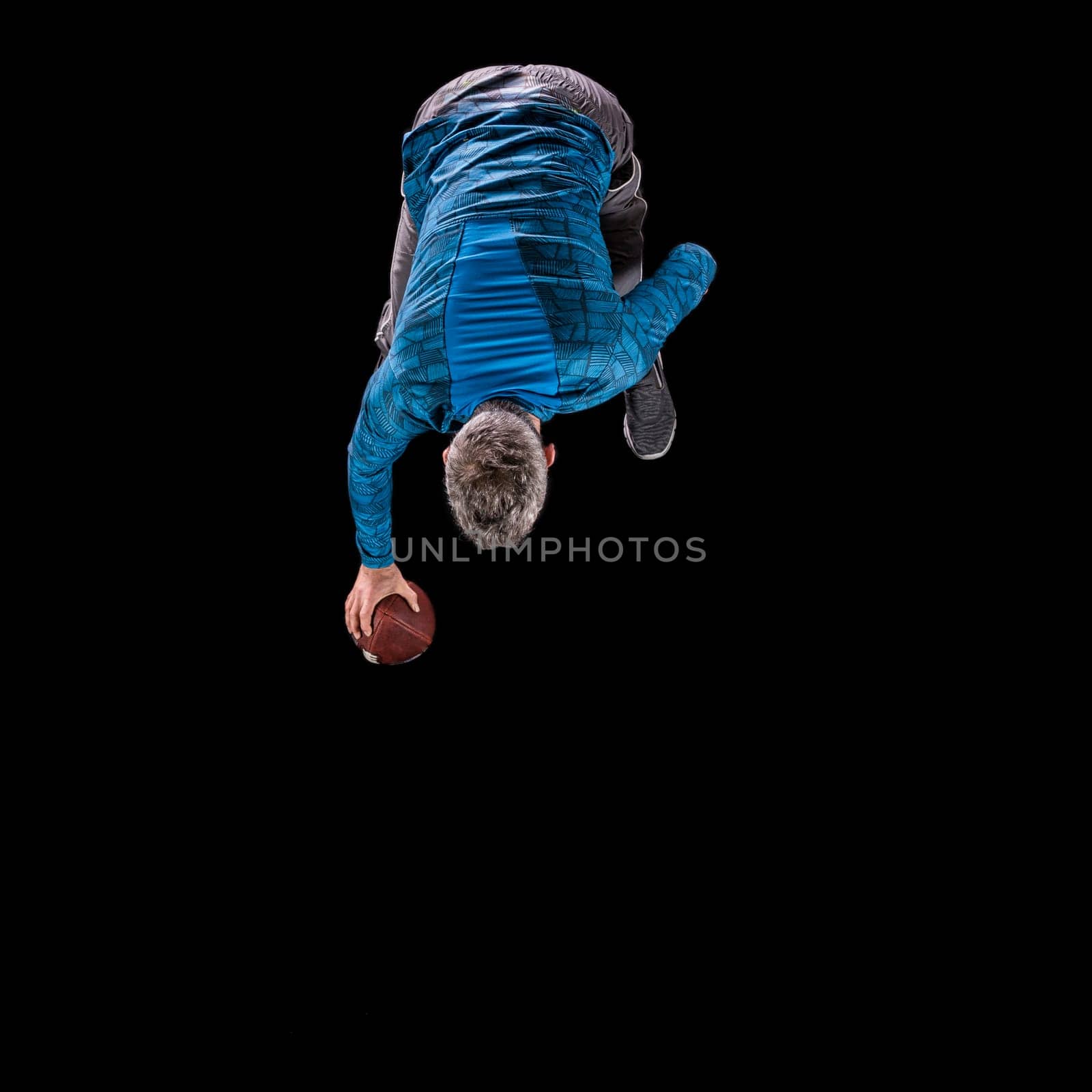 Man plays rugby,view from above