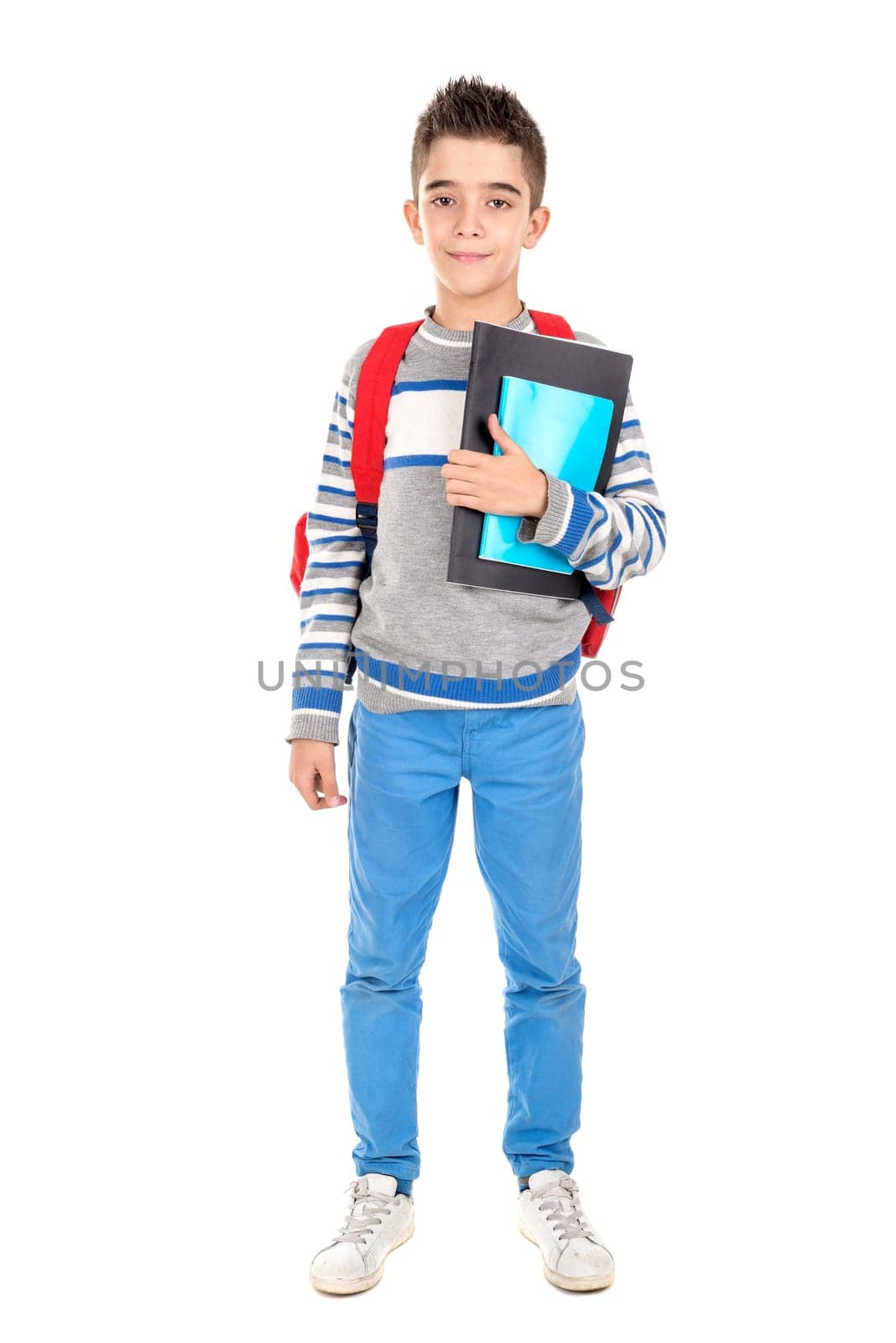 Young boy posing ready to go back to school