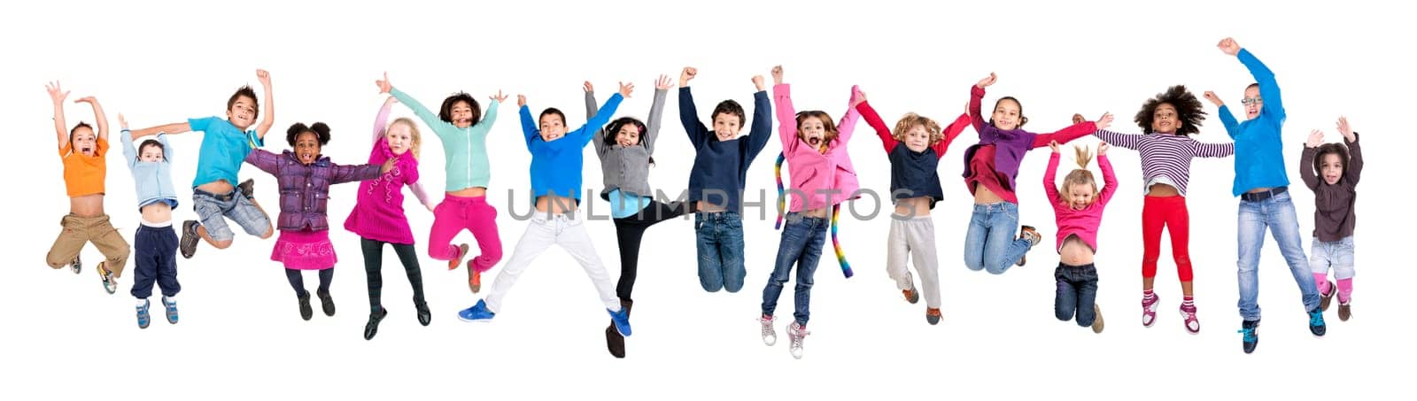 Large group of happy kids jumping isolated in white