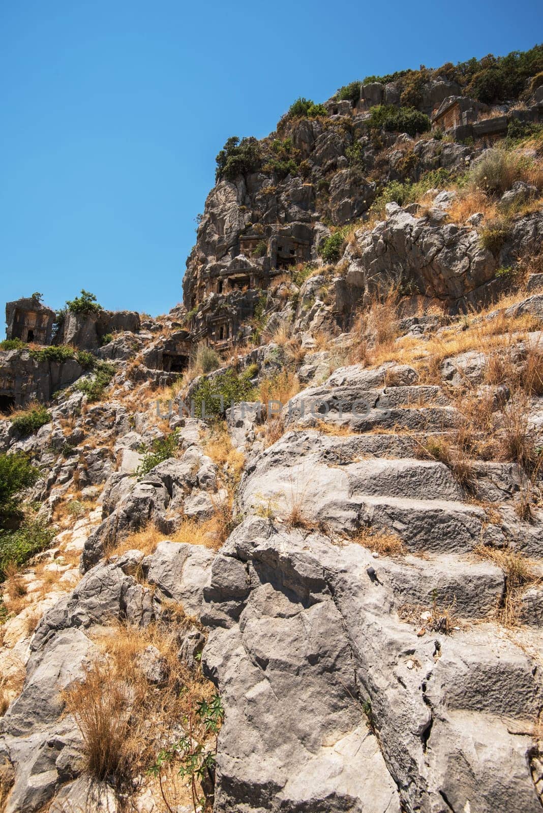 Ancient lycian Myra rock tomb ruins at Turkey Demre