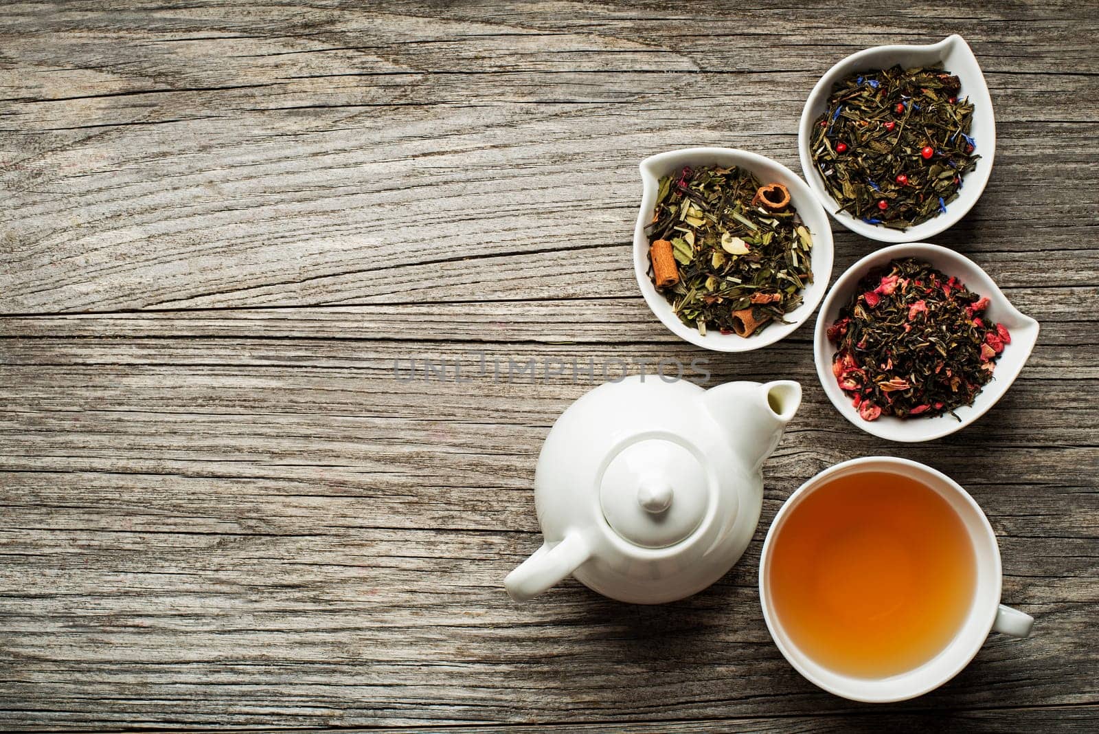 Cup of tea with dry tea collection of different types