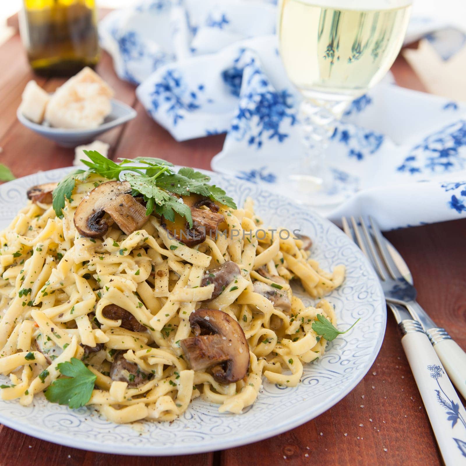 Taglietelle noodles with mushrooms and cream vinegar