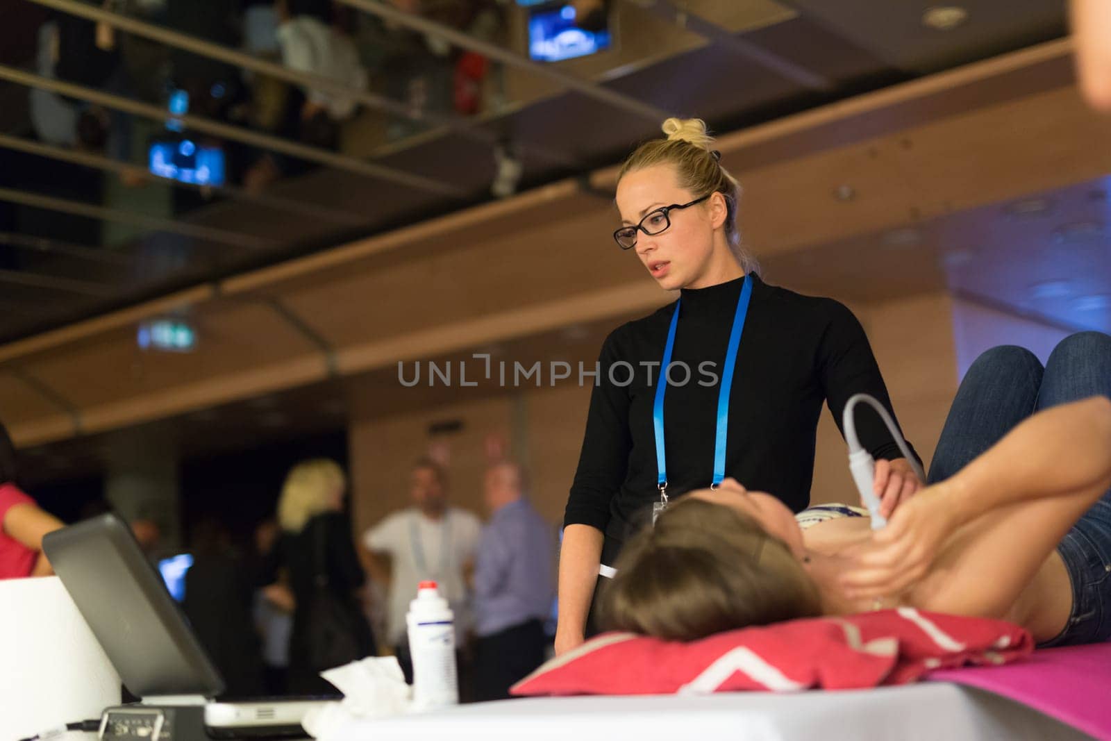Female medical doctor students learning to do on ultrasound techniques workshop.