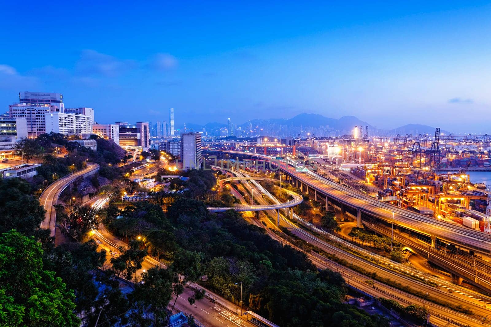 container terminal and stonecutter bridge in Hong Kong at sunset