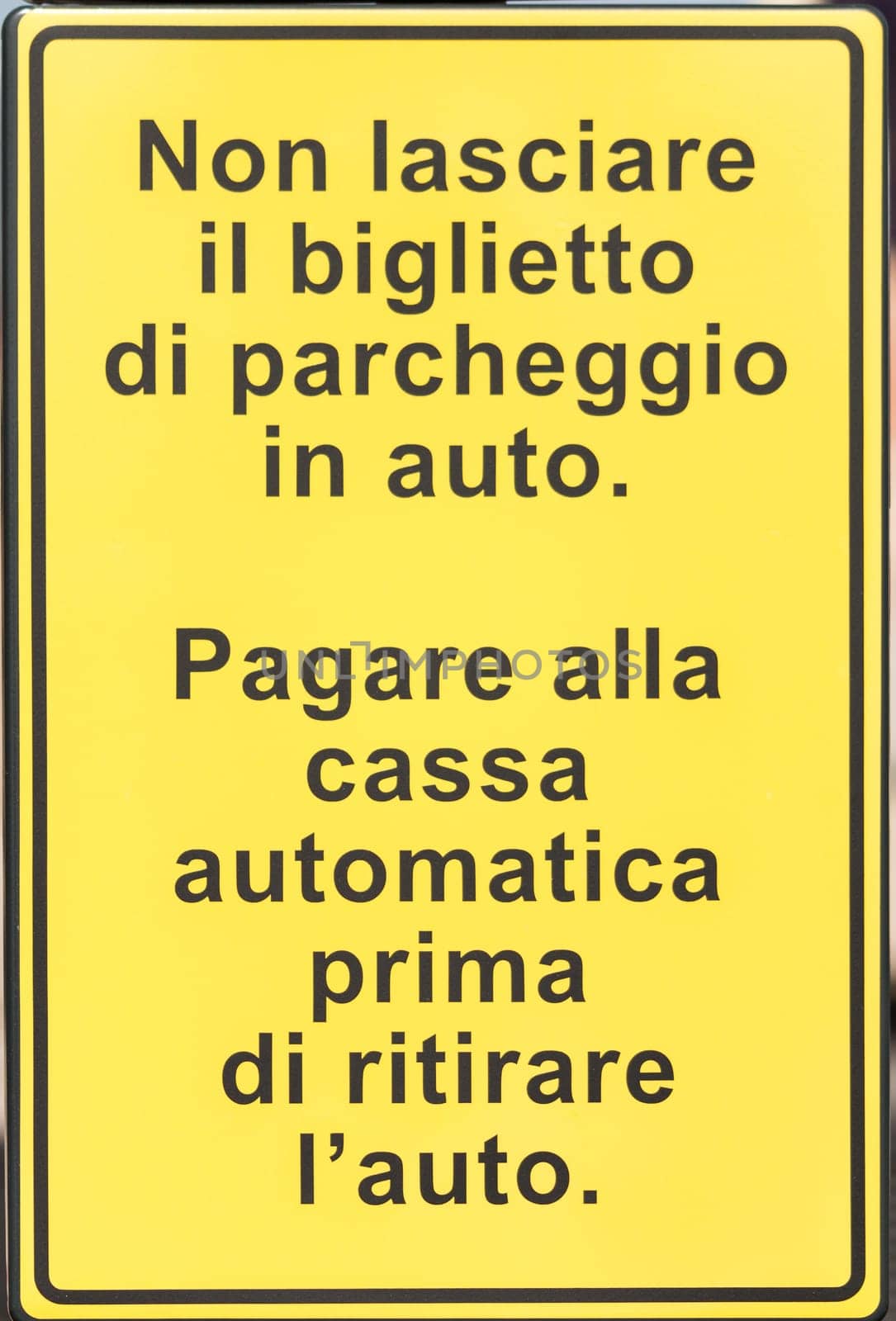 Metal sign with directions and instructions in Italian