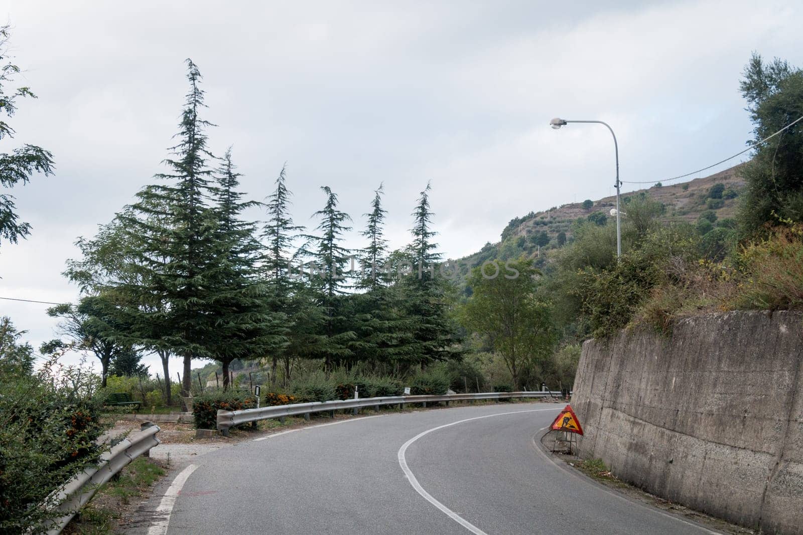Lonely road before Novara di Sicilia little village on nebrodi mountain