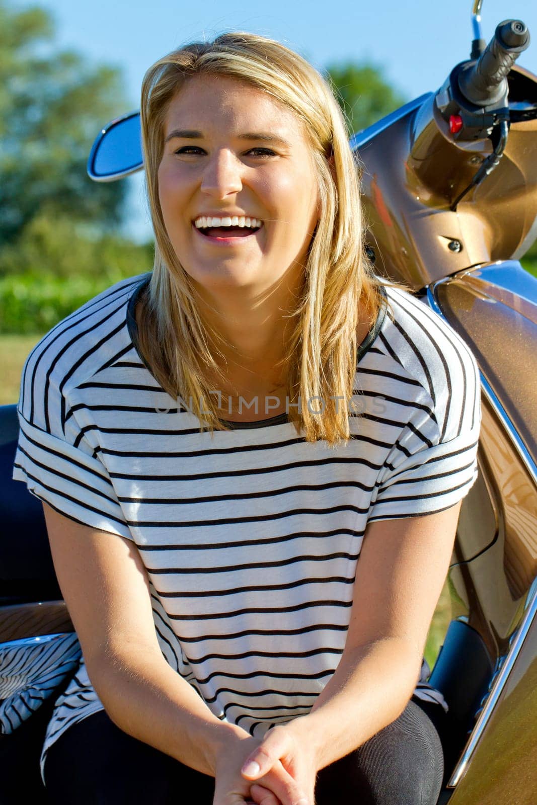 Young happy woman in summer
