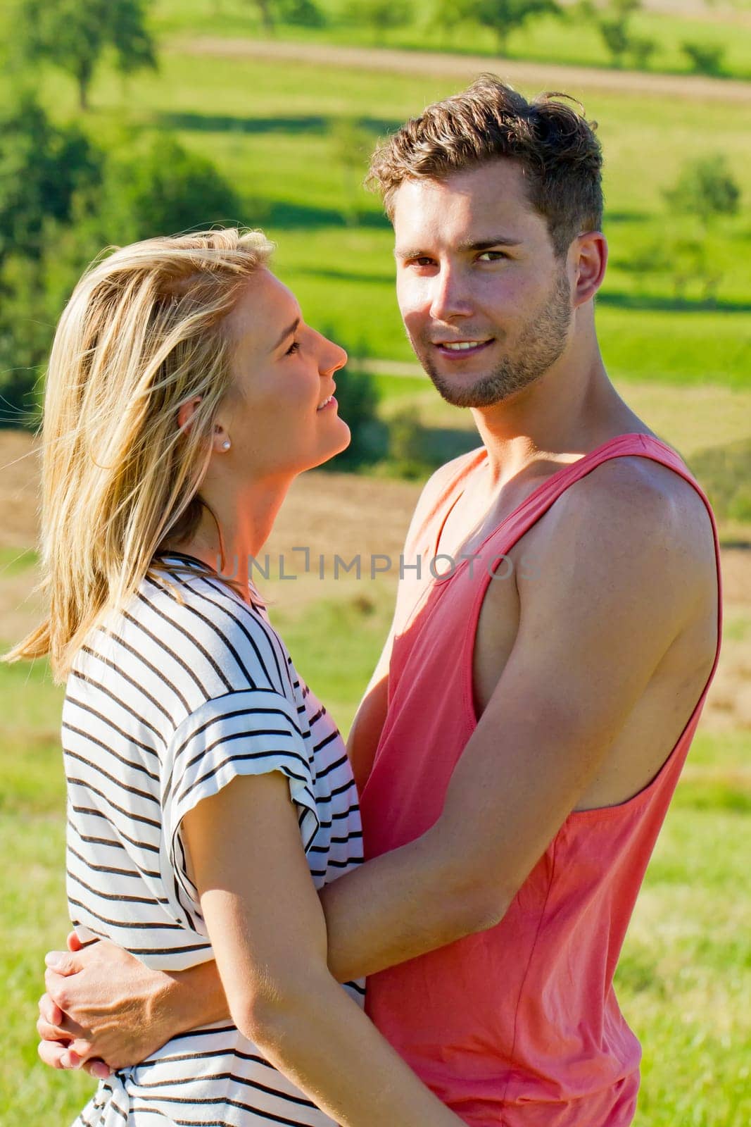 Young,happy couple out in nature