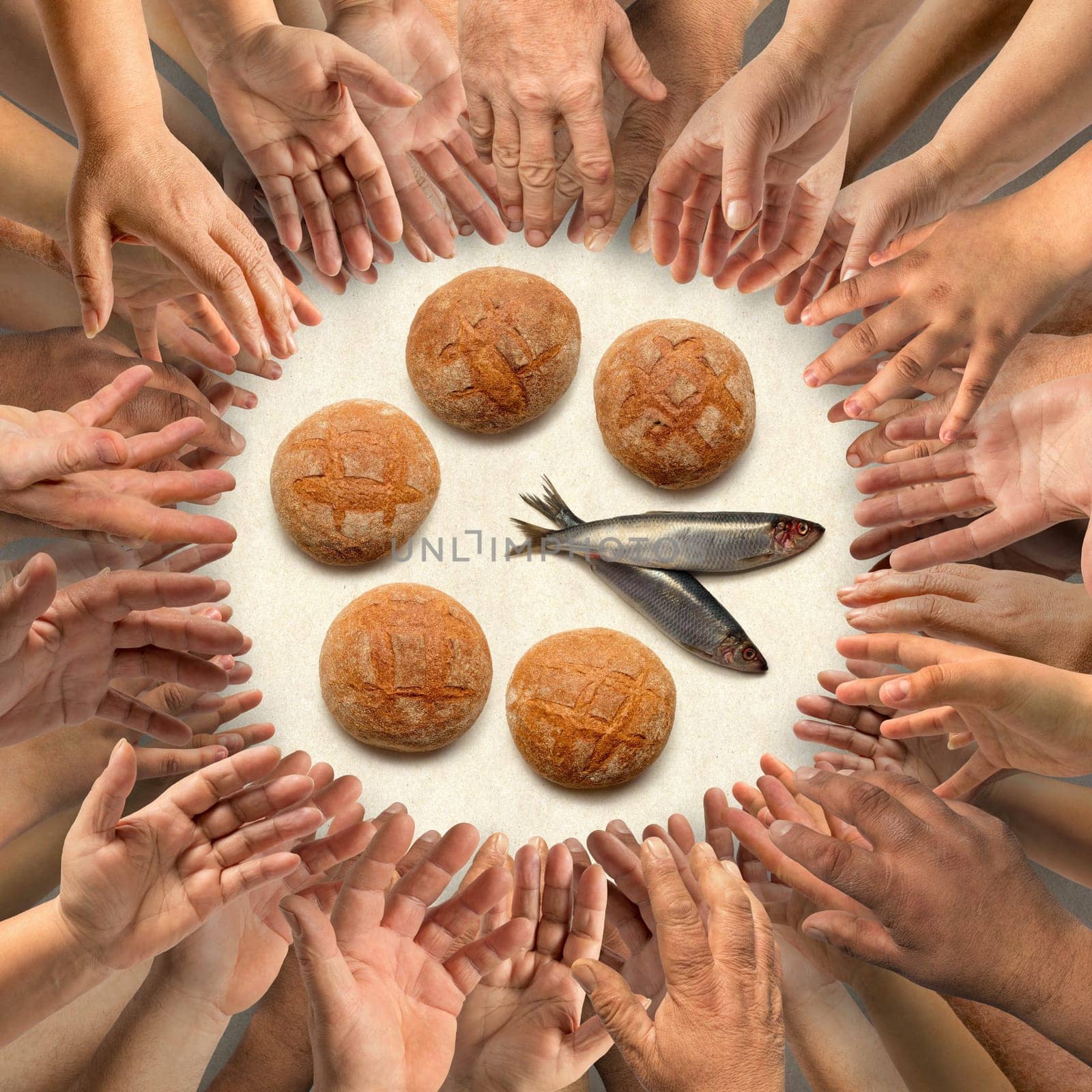 Many hands stretching around five small barley loaves and two small fish