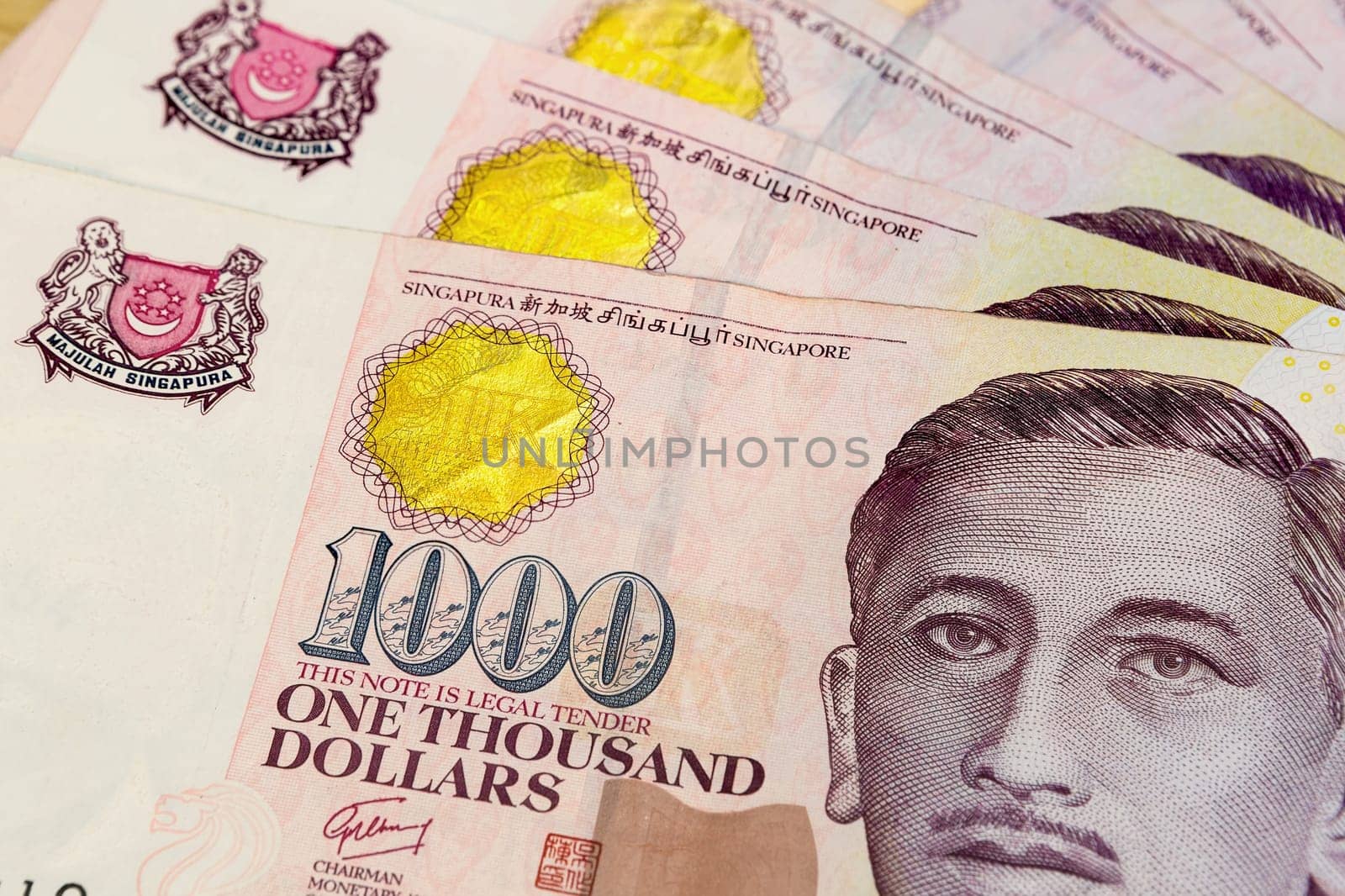 Singapore currency one thousand dollars bill notes closeup macro