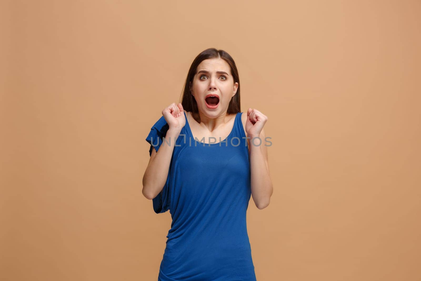 I'm afraid. Fright. Portrait of the scared woman. Business woman standing isolated on trendy pastel studio background. Female half-length portrait. Human emotions, facial expression concept. Front view