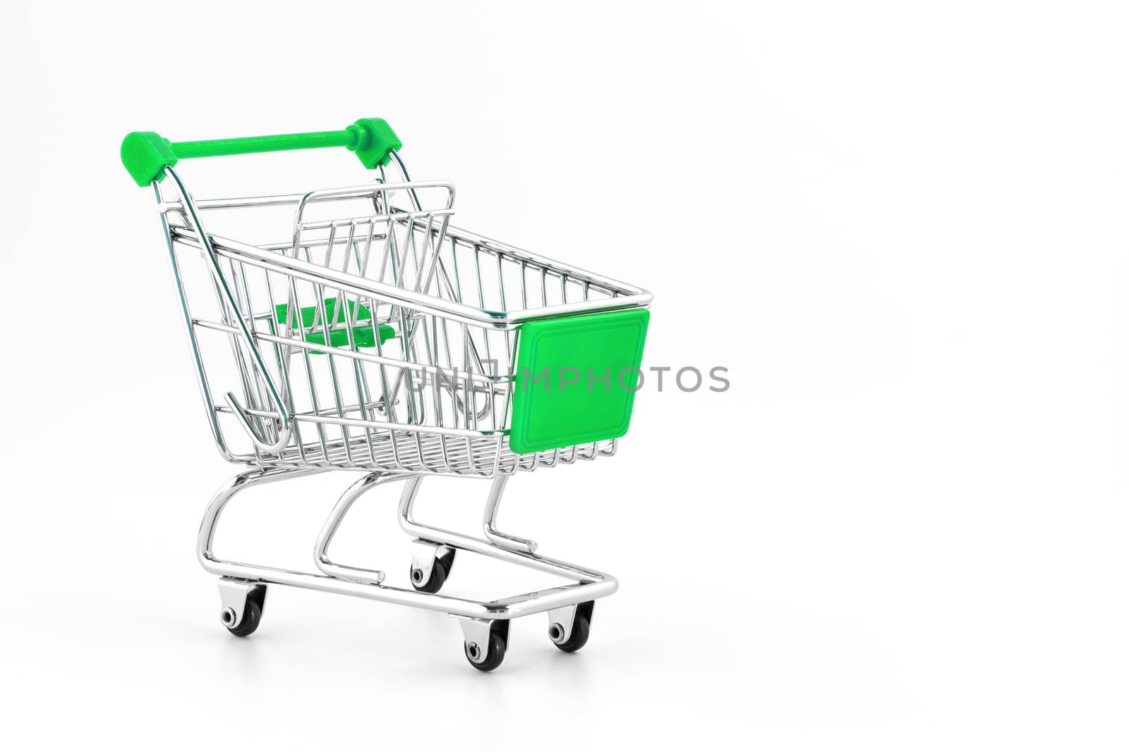 Small metal shopping cart isolated on white background
