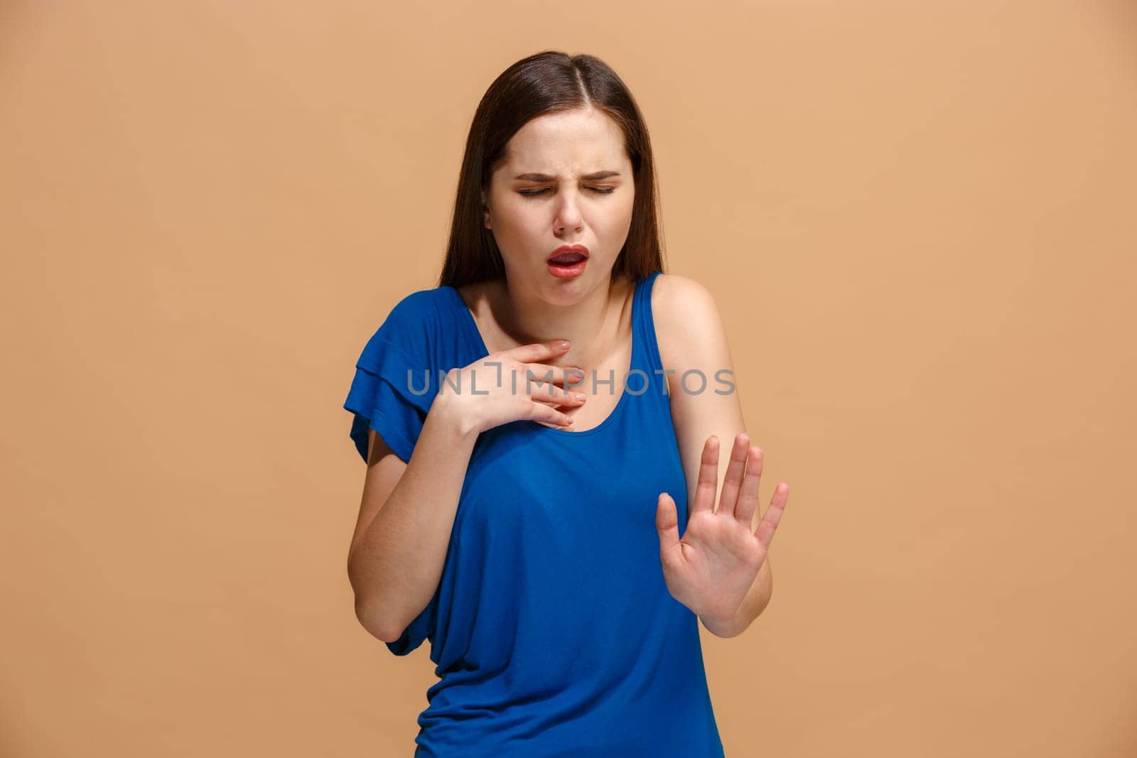 Reject, rejection, doubt concept. Disgust woman with thoughtful expression making choice. Young emotional woman. Human emotions, facial expression concept. Front . Studio. Isolated on trendy pastel