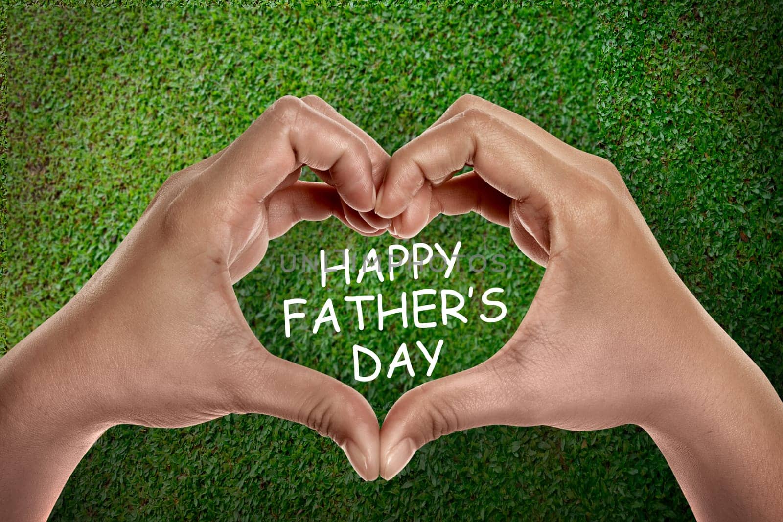 Heart shape from hands with text Happy fathers day. Fathers day concept