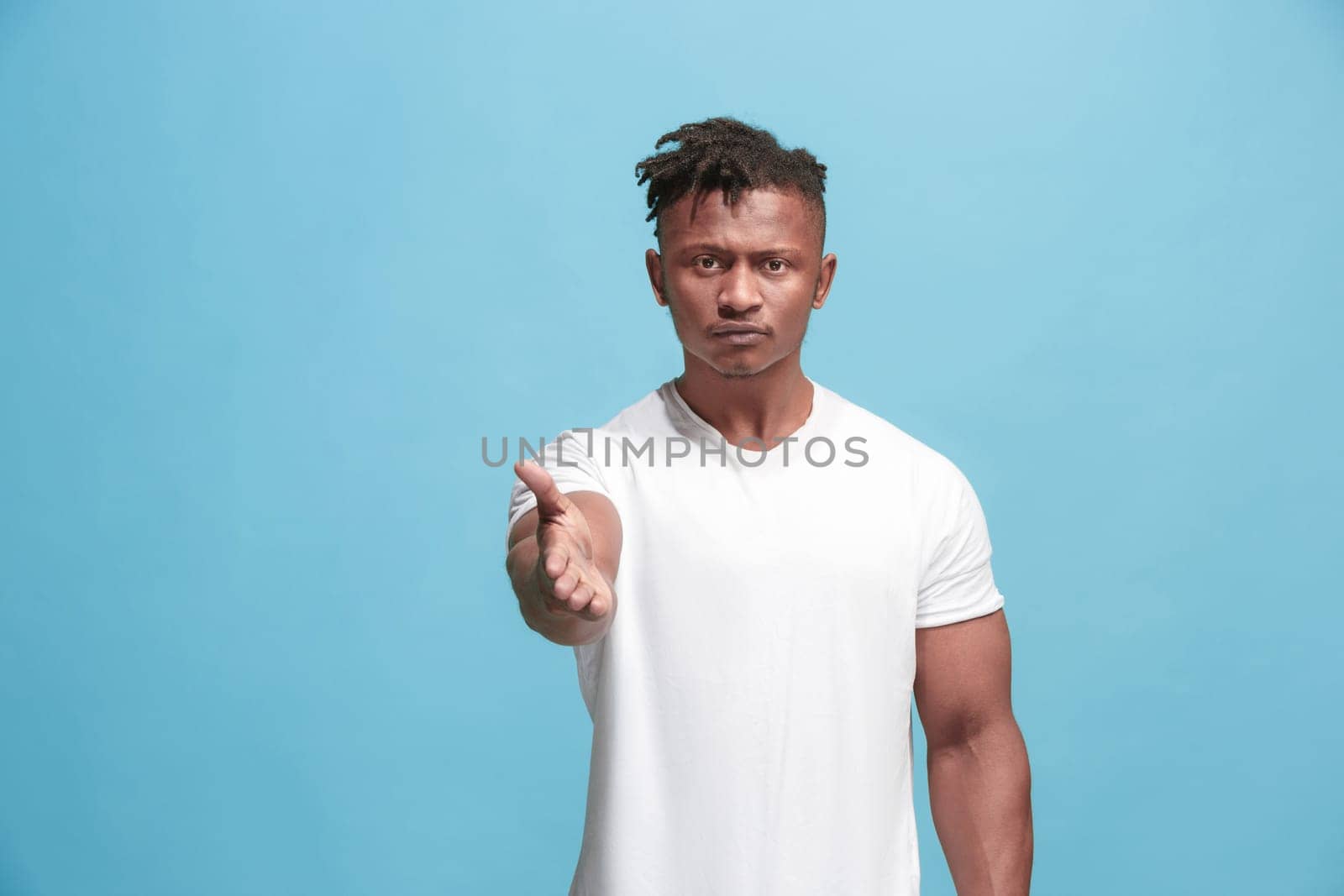 I choose you and order. African american businessman point you, want you, half length closeup portrait on blue studio background. The human emotions, facial expression concept. Front view. Trendy colors