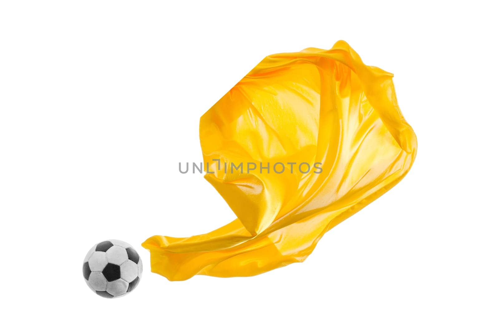 Soccer ball and Smooth elegant transparent yellow cloth isolated or separated on white studio background. Texture of flying fabric. yellow. Attributes of popular game. Concept of national flag color