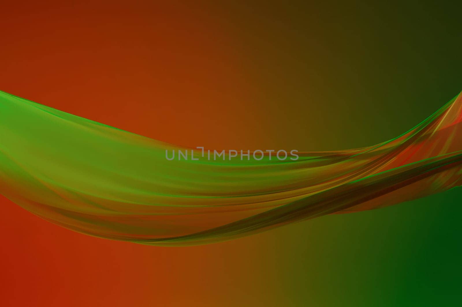 Smooth elegant transparent green cloth isolated or separated on green colored studio background. Texture of flying fabric.