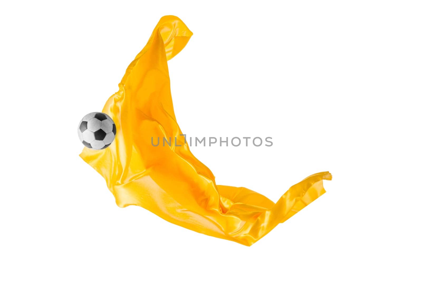Soccer ball and Smooth elegant transparent yellow cloth isolated or separated on white studio background. Texture of flying fabric. yellow. Attributes of popular game. Concept of national flag color