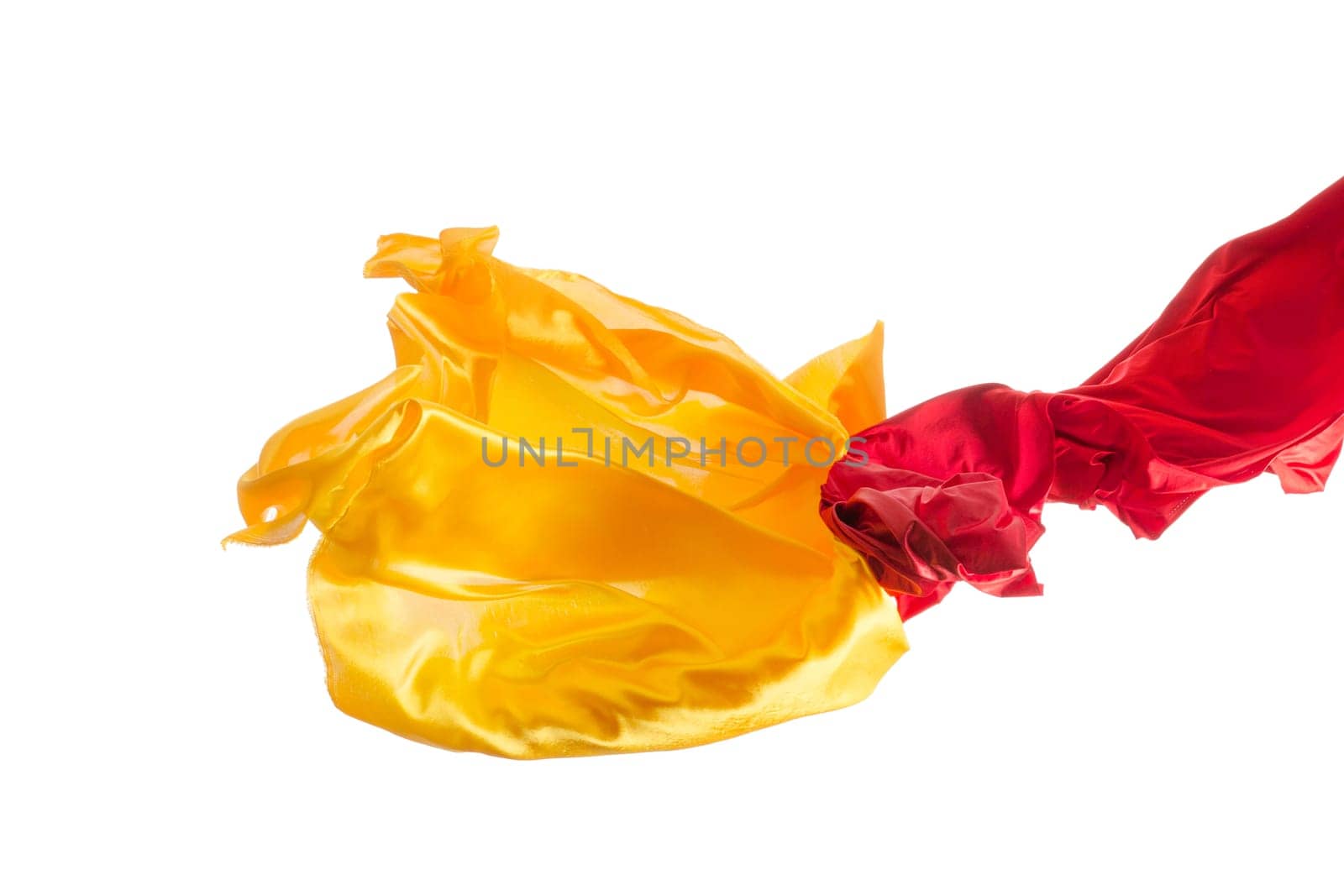 Smooth elegant transparent yellow, red, cloth isolated or separated on white studio background. Texture of flying fabric.