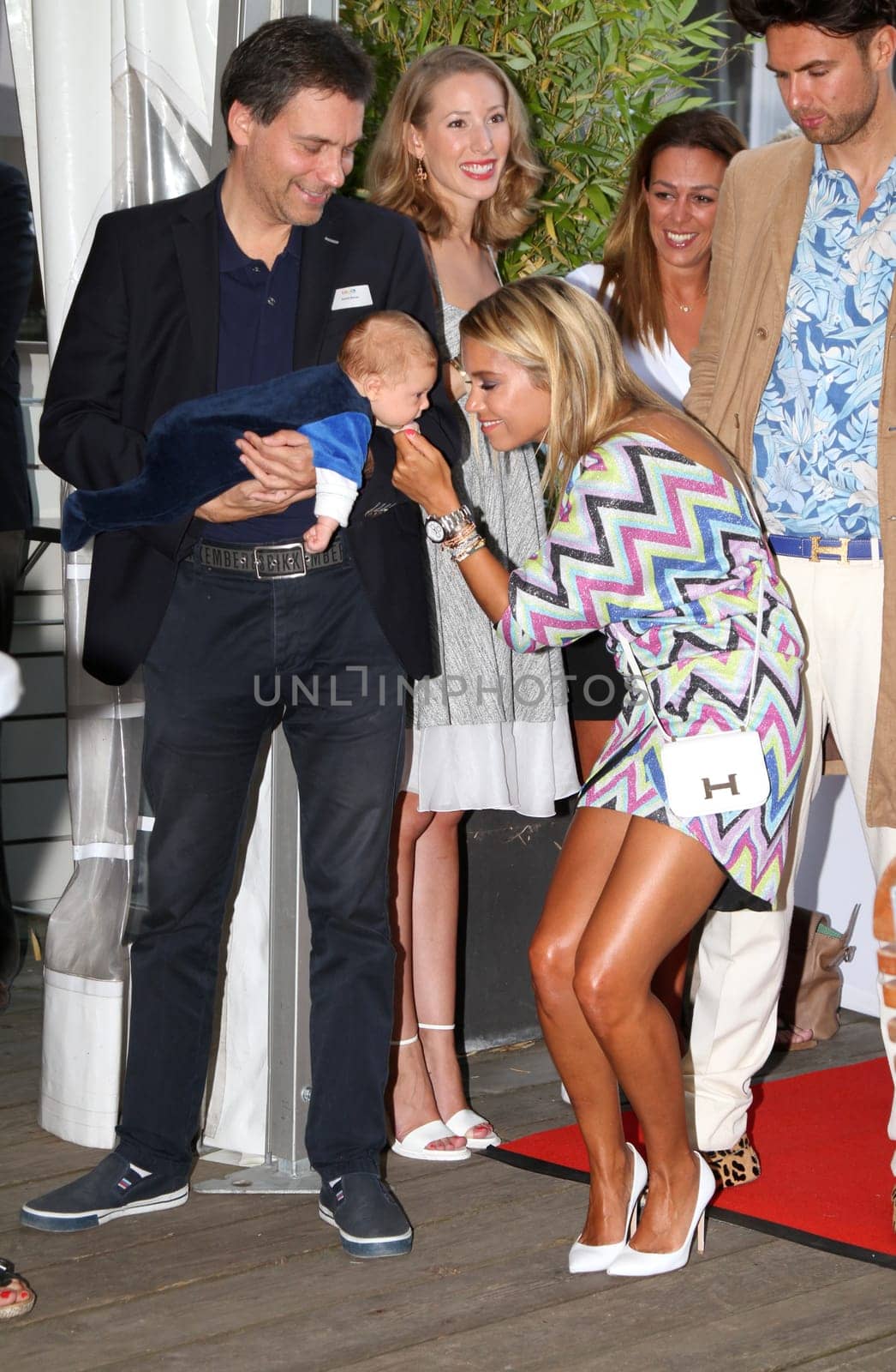 Sylvie Meis with baby Alexander Lucien Rienau and Andre Borchers at the RTL Summer Festival in Hamburg / Archive photos