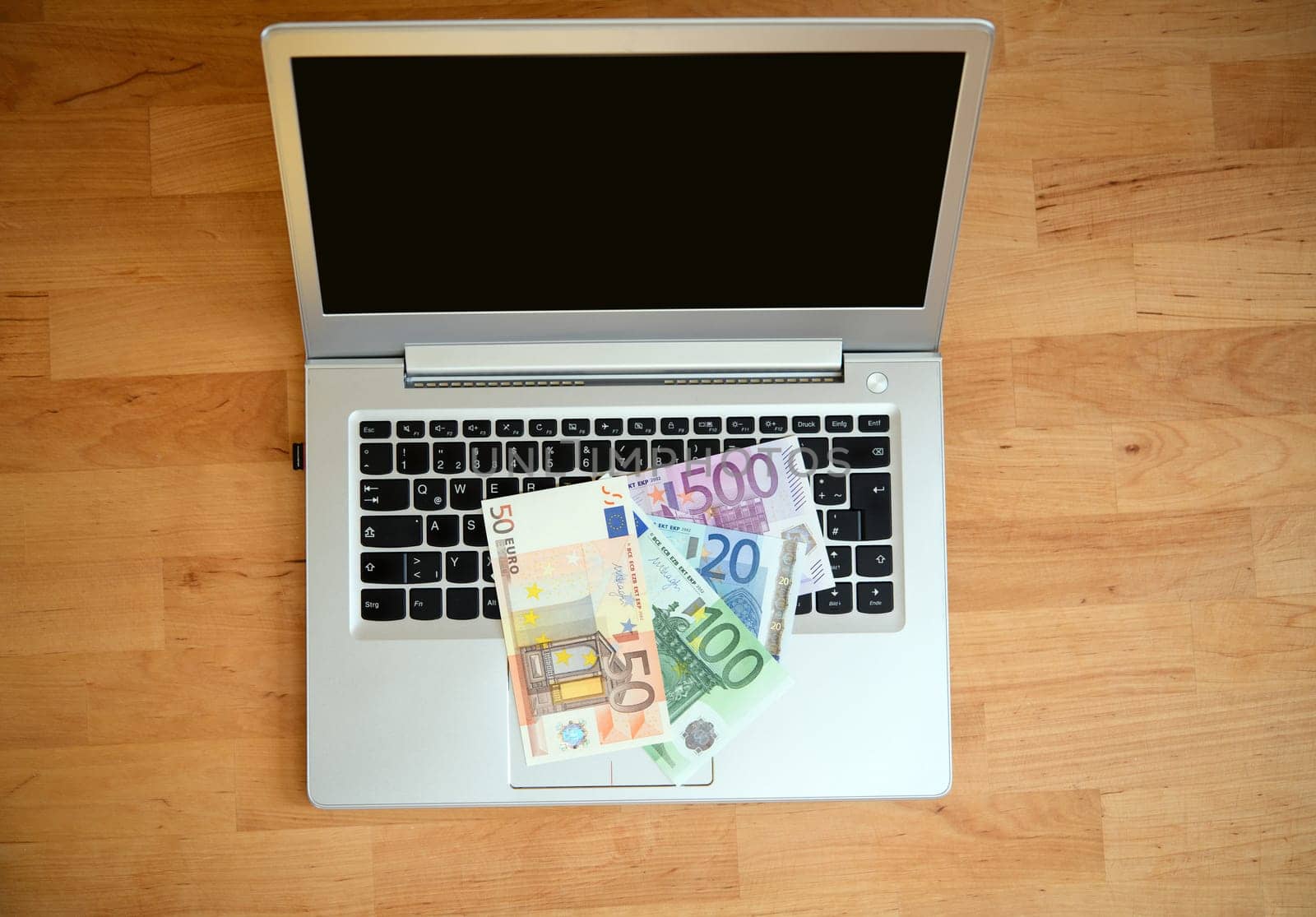 still life- computer keyboard with euro bank notes