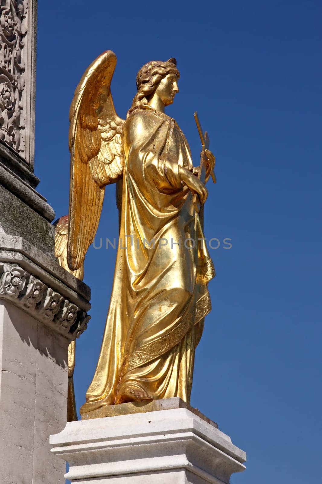 Golden statue of angel near Cathedral of Virgin Mary, Zagreb, Croatia
