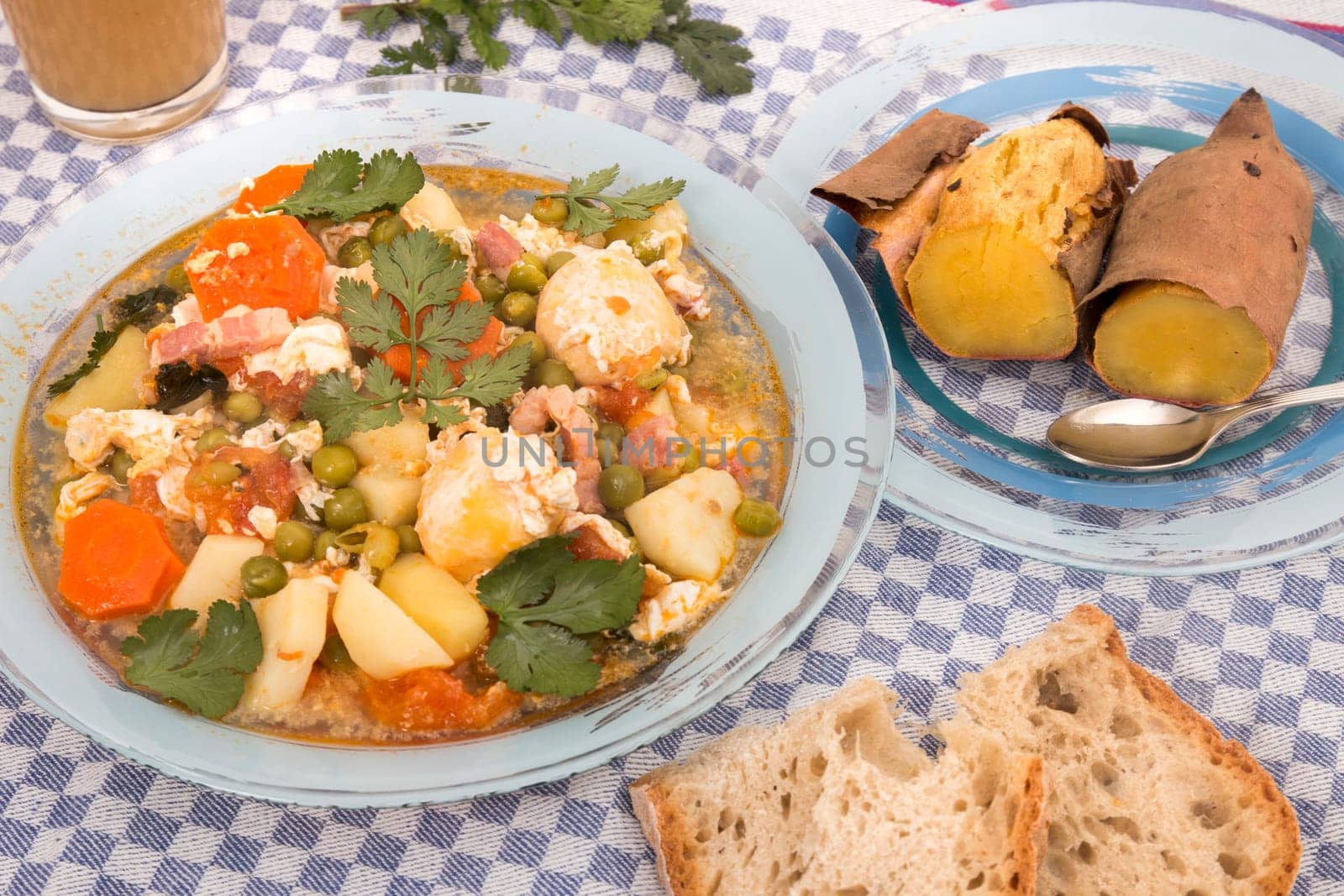 Traditional portuguese culinary meal of green peas with egg, potatoes and carrots.